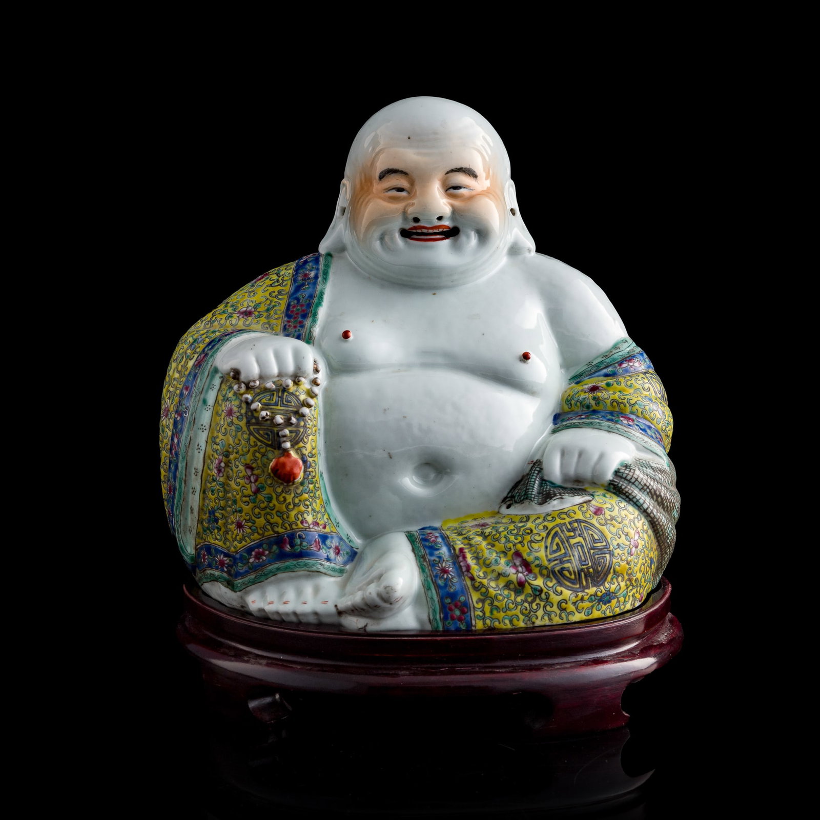 A Chinese famille rose figure of Maitreya, Republic period: A Chinese famille rose figure of Maitreya Republic period With eight-character "Jiangxi Jingzhen Zhu Maoji zao" mark to underside. Sold with associated wooden stand. H: 10 1/4, W: 10 5/8, D: 7 3/4 in.