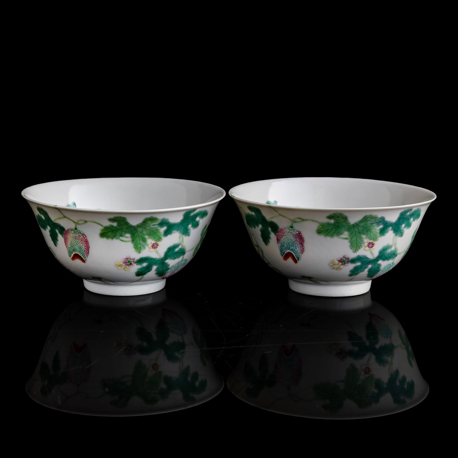 A pair of Chinese famille rose 'melon' bowls, Daoguang period, Qing dynasty: A pair of Chinese famille rose 'melon' bowls Daoguang period, Qing dynasty Each with four-character 'Legu Tang zhi' mark to underside; sold with a brocade box. (2). H: 2 7/8, Dia: 6 1/8 in. (H: 7.3, D