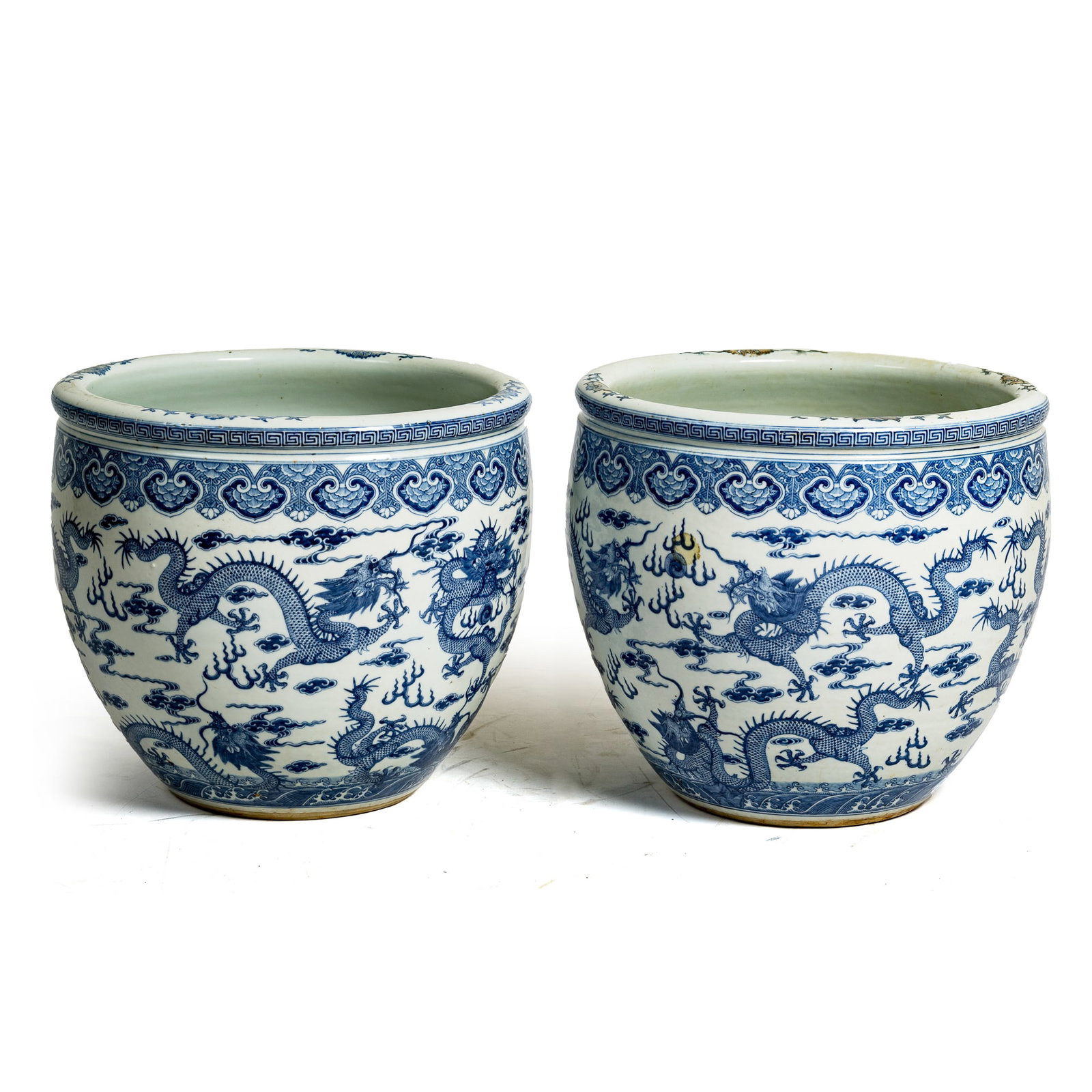 A pair of Chinese blue and white 'cloud and dragon' jardinieres, 19th century (1 of 12)