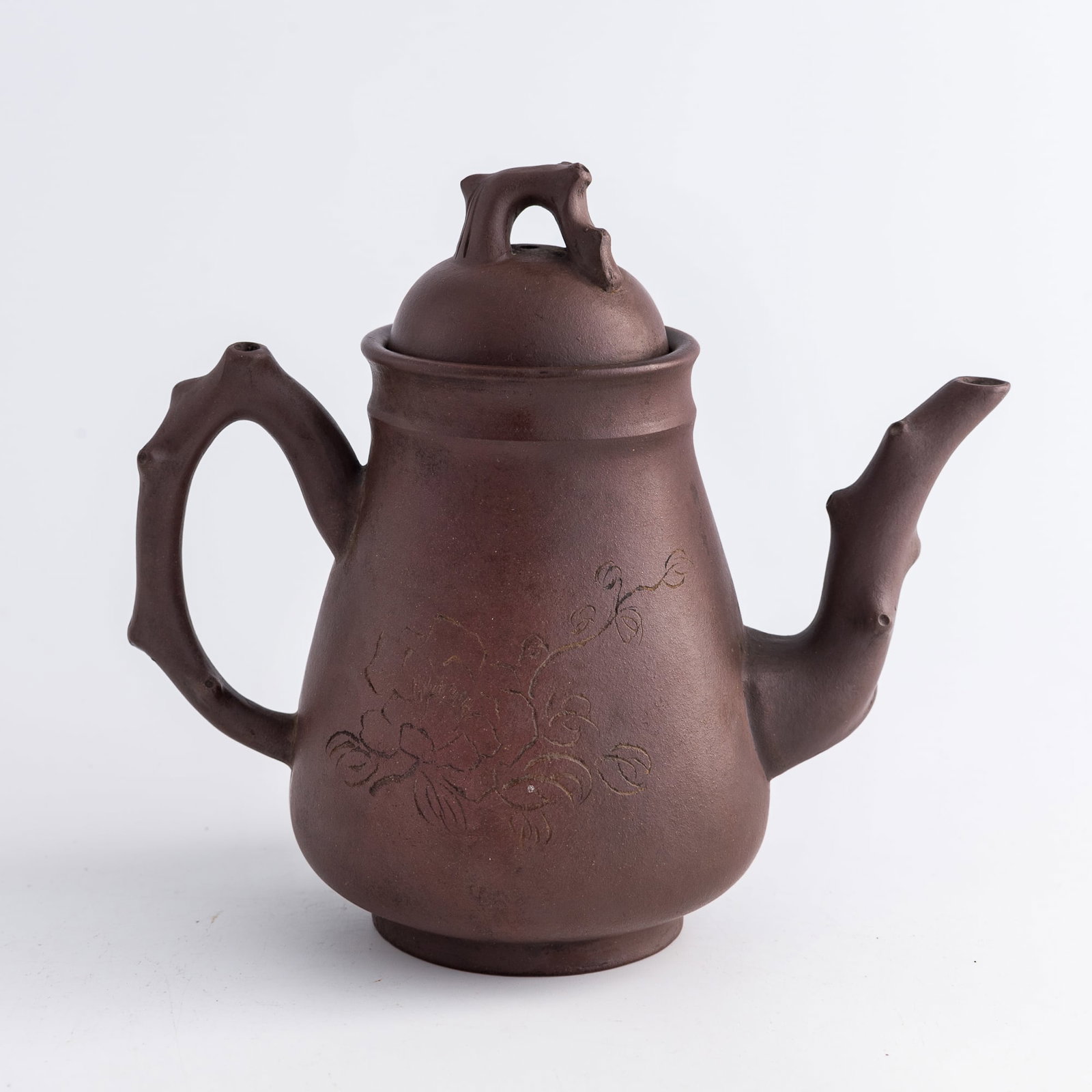 A Chinese Yixing zisha 'floral' and 'inscription' teapot, Qing dynasty/Republic period (1 of 9)