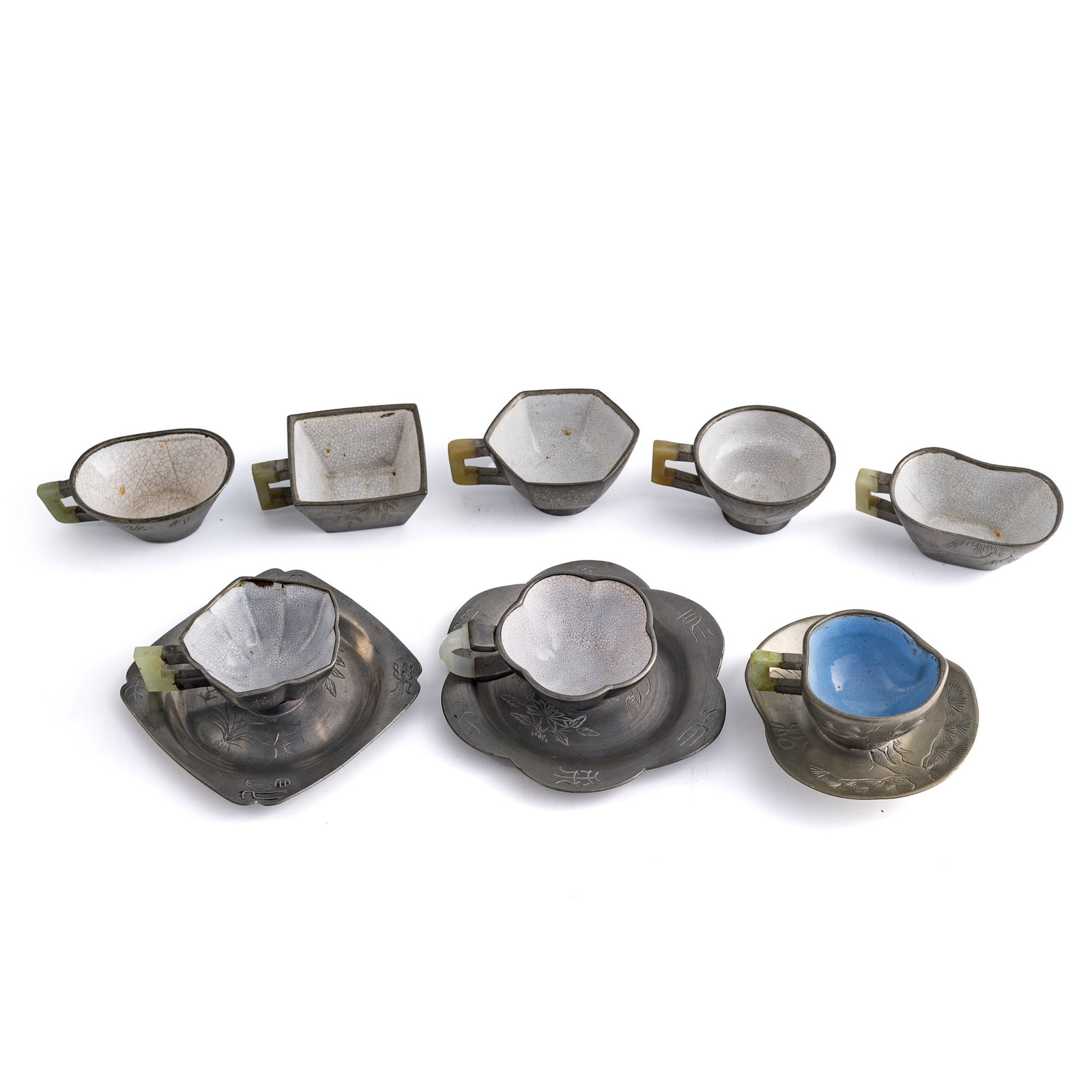 A collection of Chinese pewter-mounted Yixing cups and trays, Qing/Republic period (1 of 13)