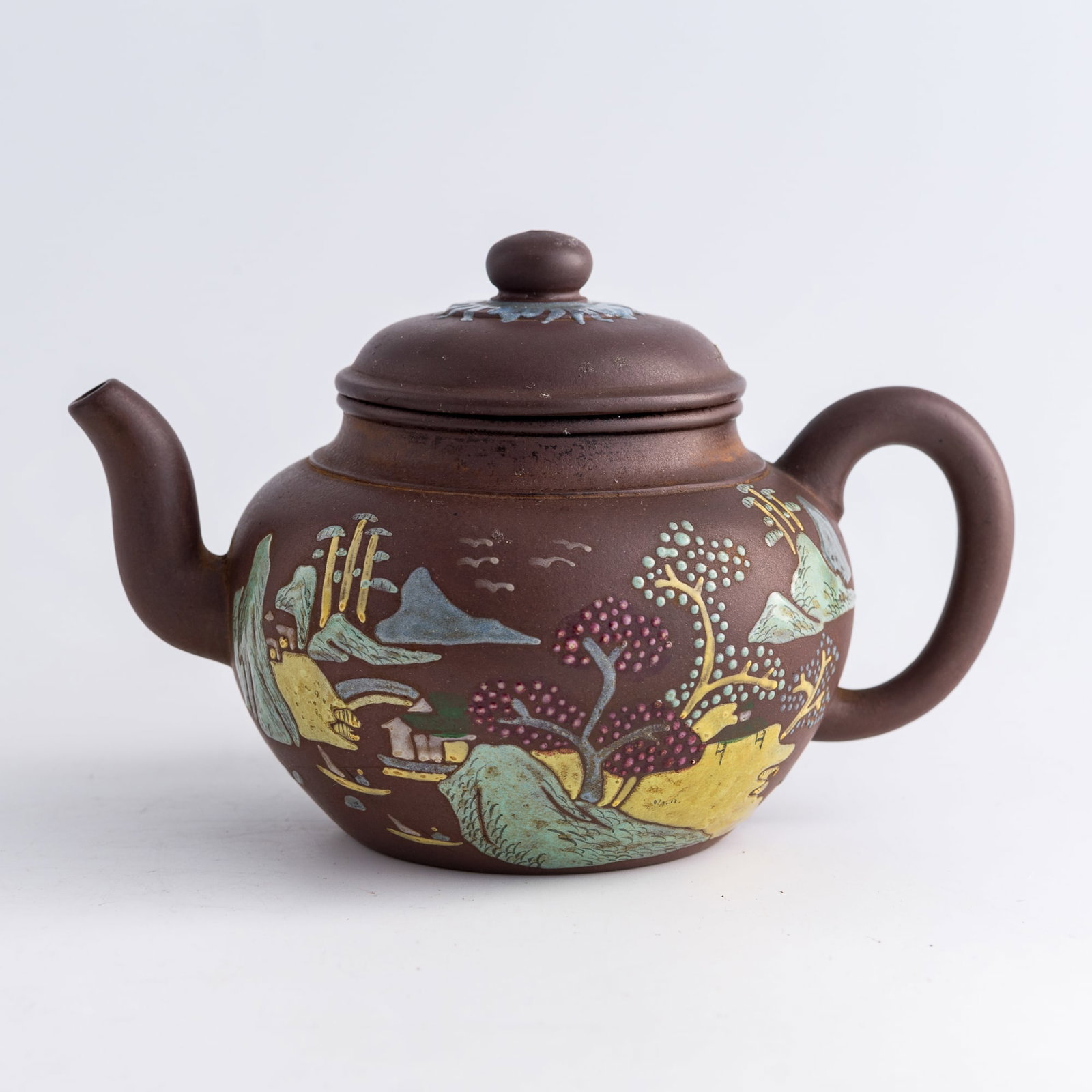 A Chinese enameled Yixing zisha 'landscape' teapot, Qing dynasty (1 of 8)