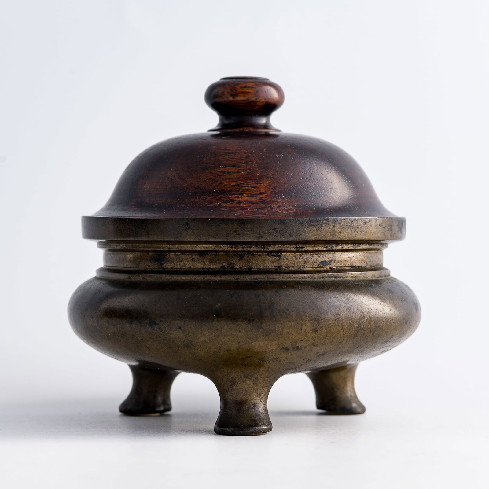 A Chinese bronze li-form censer, 18th century (1 of 9)