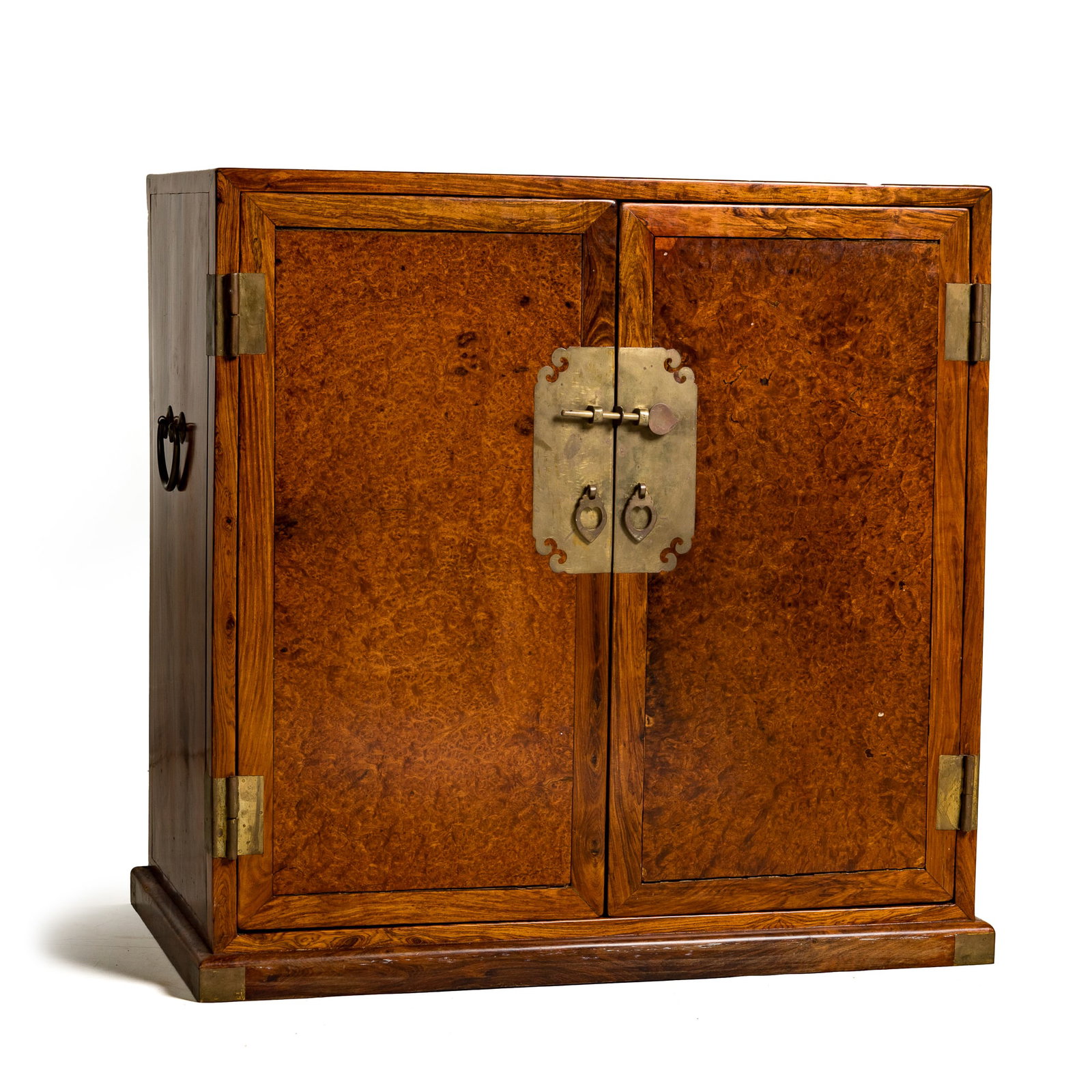A Chinese huanghuali two-door cabinet with burlwood panels: A Chinese huanghuali two-door cabinet with burlwood panels H: 28 3/8, W: 29 1/2, D: 16 1/2 in. (H: 72.1, W: 74.9, D: 41.9 cm.) Private collection, Pennsylvania. Click here