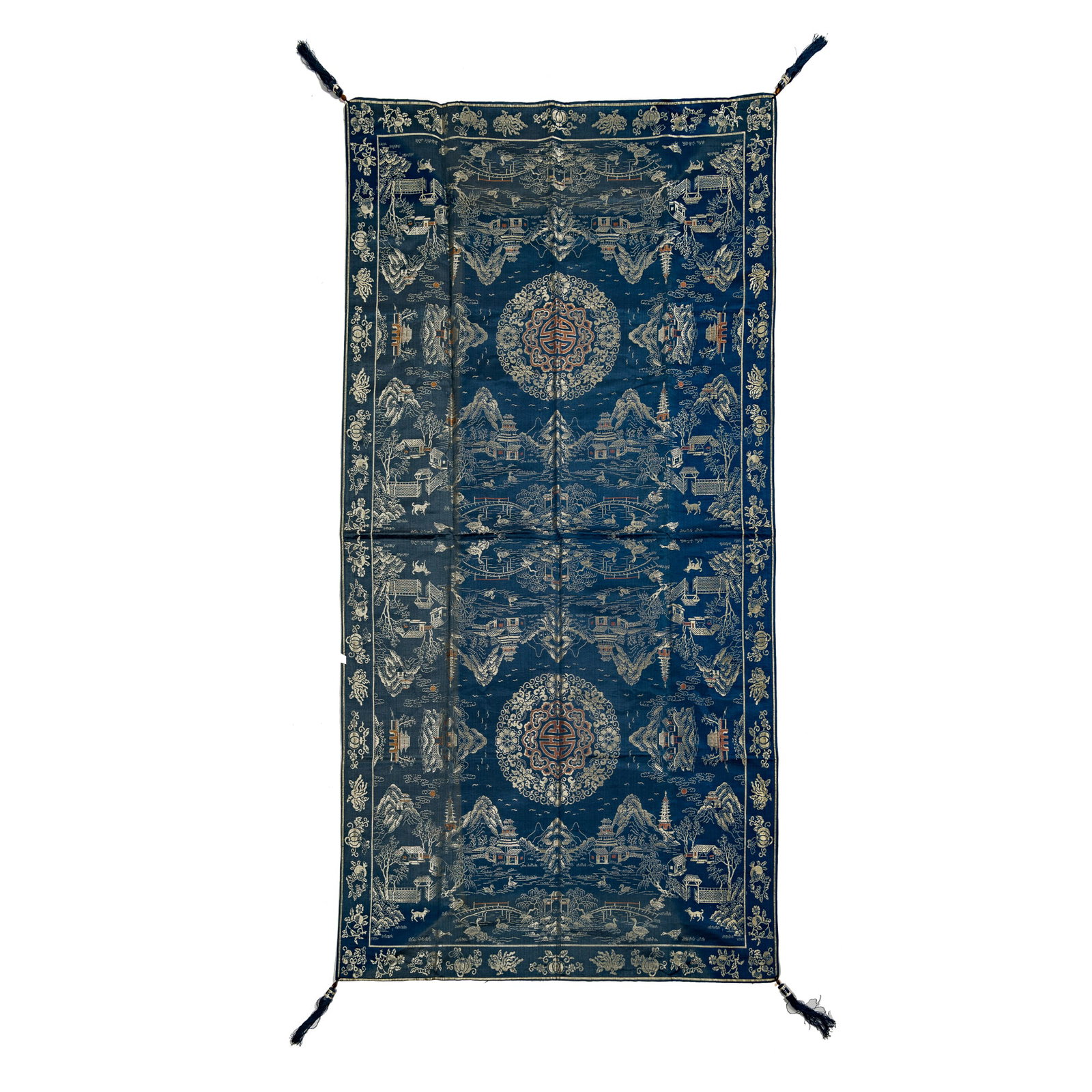 A Chinese dark blue brocade landscape table cover, 19th century: A Chinese dark blue brocade landscape table cover 19th century H: 67 3/4, W: 34 3/4 in. (H: 172,1, W: 88.3 cm.) From the estate of Dr. Reno W. Backus (1901–1979), who served as a medical missionary 
