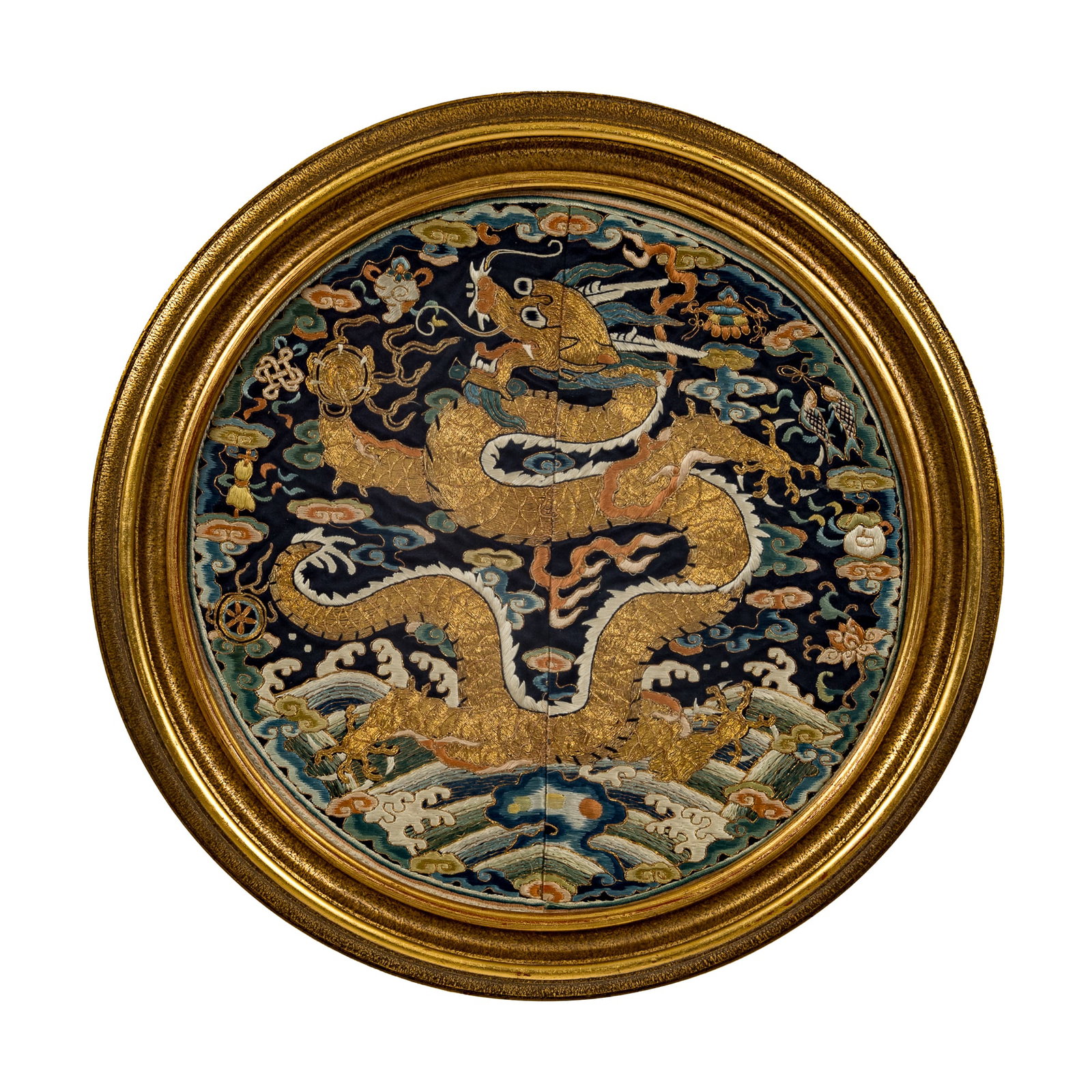 A Chinese embroidered dragon rank badge, early 19th century: A Chinese embroidered dragon rank badge early 19th century Consists of a front-facing, five-clawed dragon, a symbol reserved for the Emperor, his heir apparent, and first- and second-degree princes. S