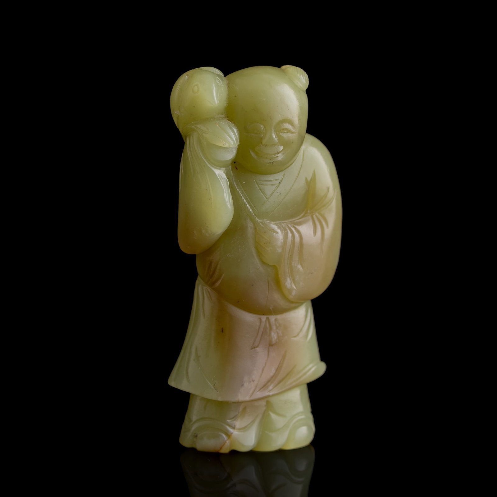 A Chinese yellow jade carving of boy holding hawk, Ming dynasty: A Chinese yellow jade carving of boy holding hawk Ming dynasty H: 3 1/8, W: 1 3/8, D: 7/8 in. (H: 7.9, W: 3.5, D: 2.2 cm.) Private collection, Houston, Texas. Clic