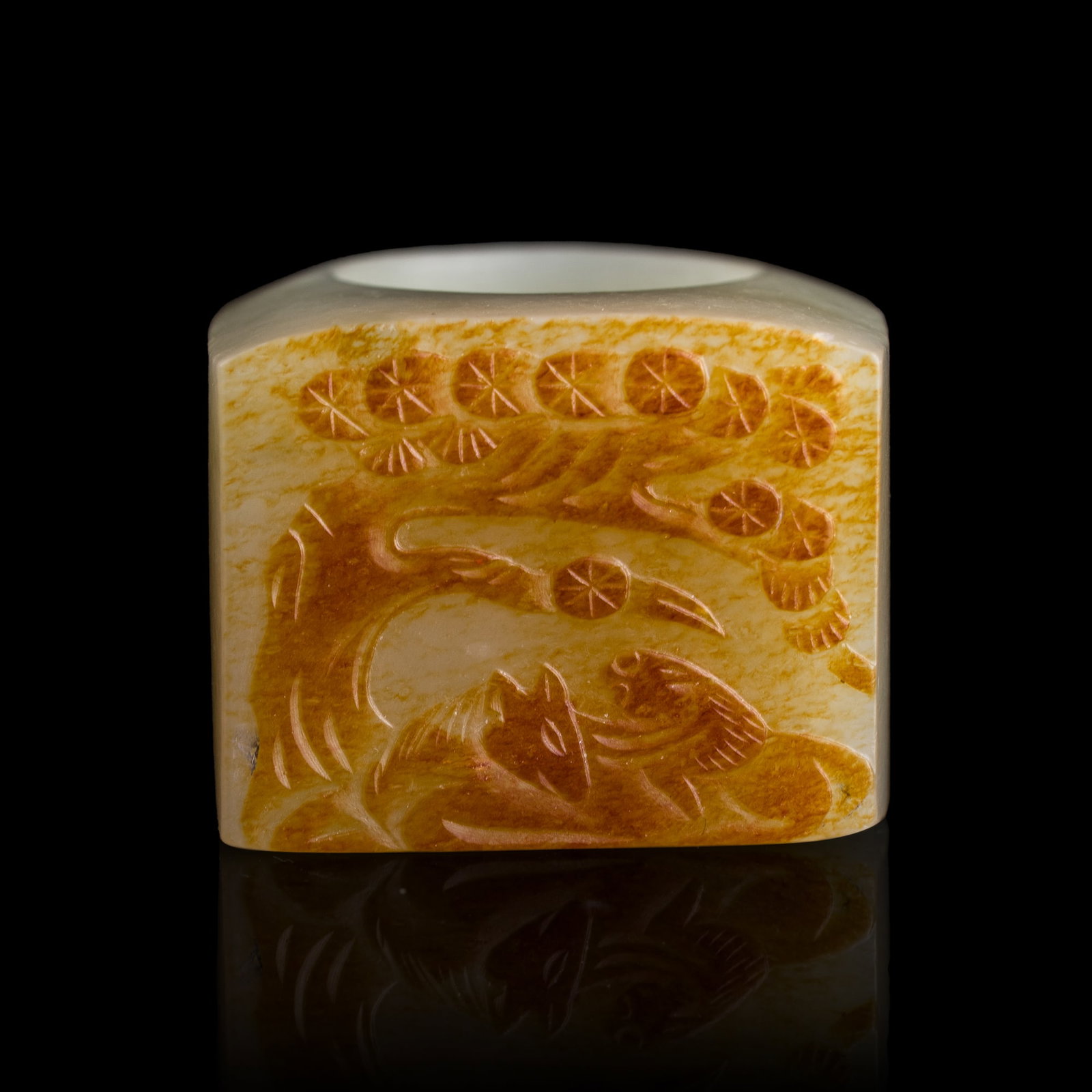 A Chinese white jade russet-skin archer's ring, 18th/19th century: A Chinese white jade russet-skin archer's ring 18th/19th century Inner Dia: 22, H: 27.9 mm From Mr. Yip of Seattle, Washington. Click here for high resolution imag