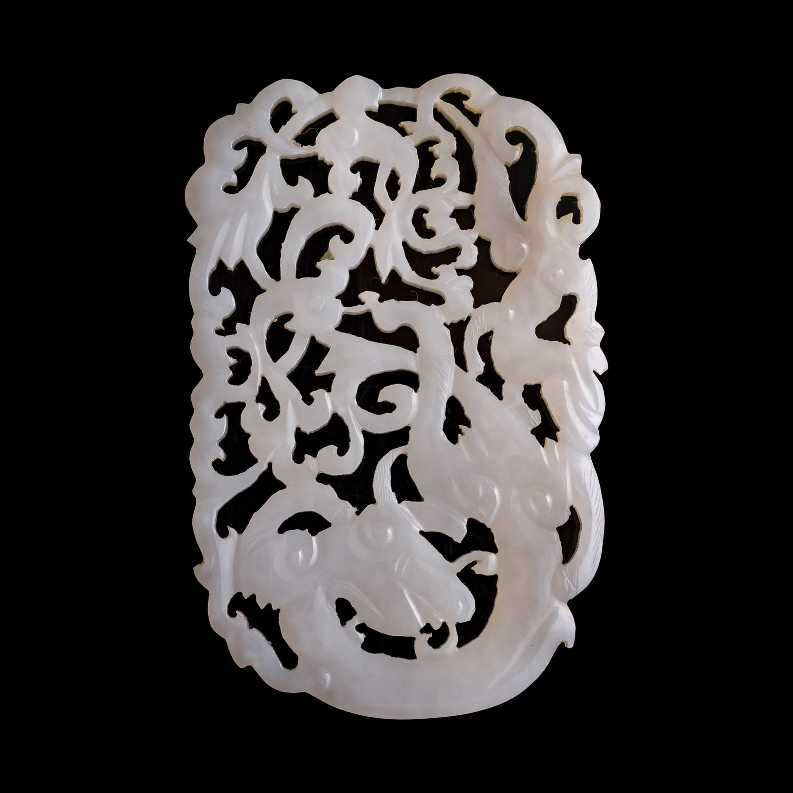 A Chinese white jade openwork 'chilong' pendant, 18th/19th century (1 of 6)