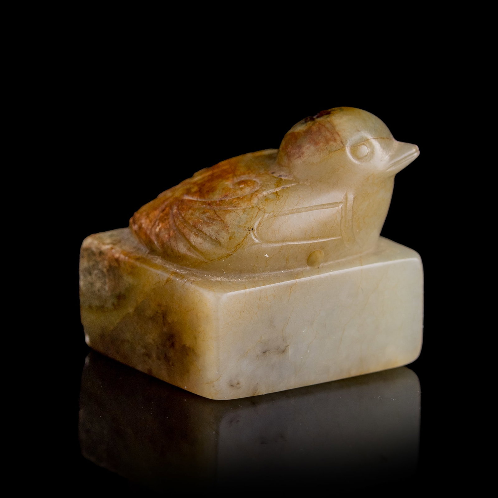 A Chinese carved jade seal with bird knob, Ming dynasty: A Chinese carved jade seal with bird knob Ming dynasty H: 1 1/8, W: 1 1/8, D: 1 1/8 in. (H: 2.9, W: 2.9, D: 2.9 cm.) Private collection, Arlington, Virginia. Click