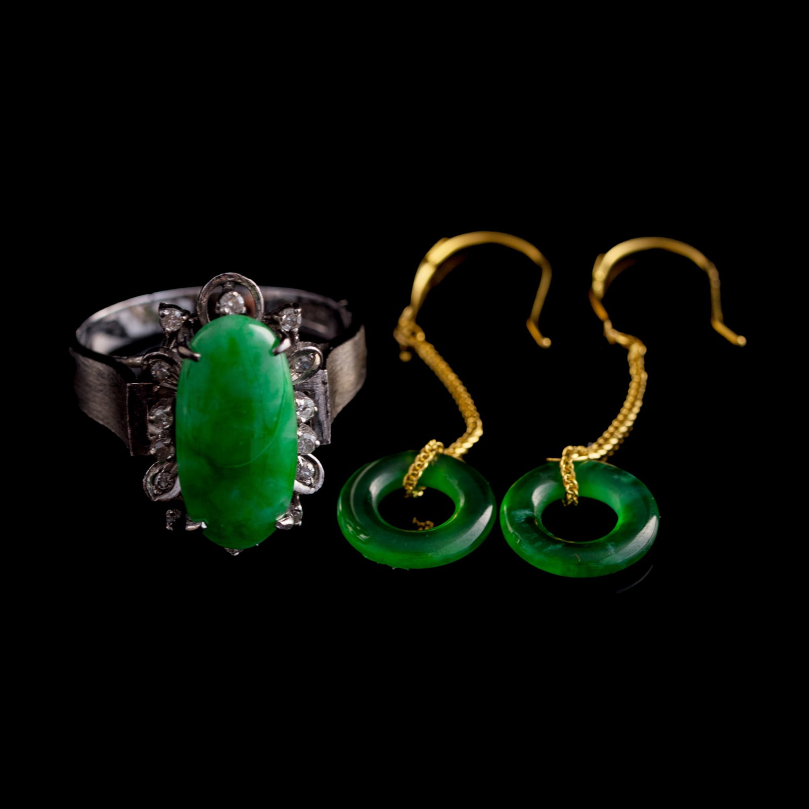 A pair of Chinese jadeite earrings and a jadeite-set ring, Republic period or later (1 of 10)