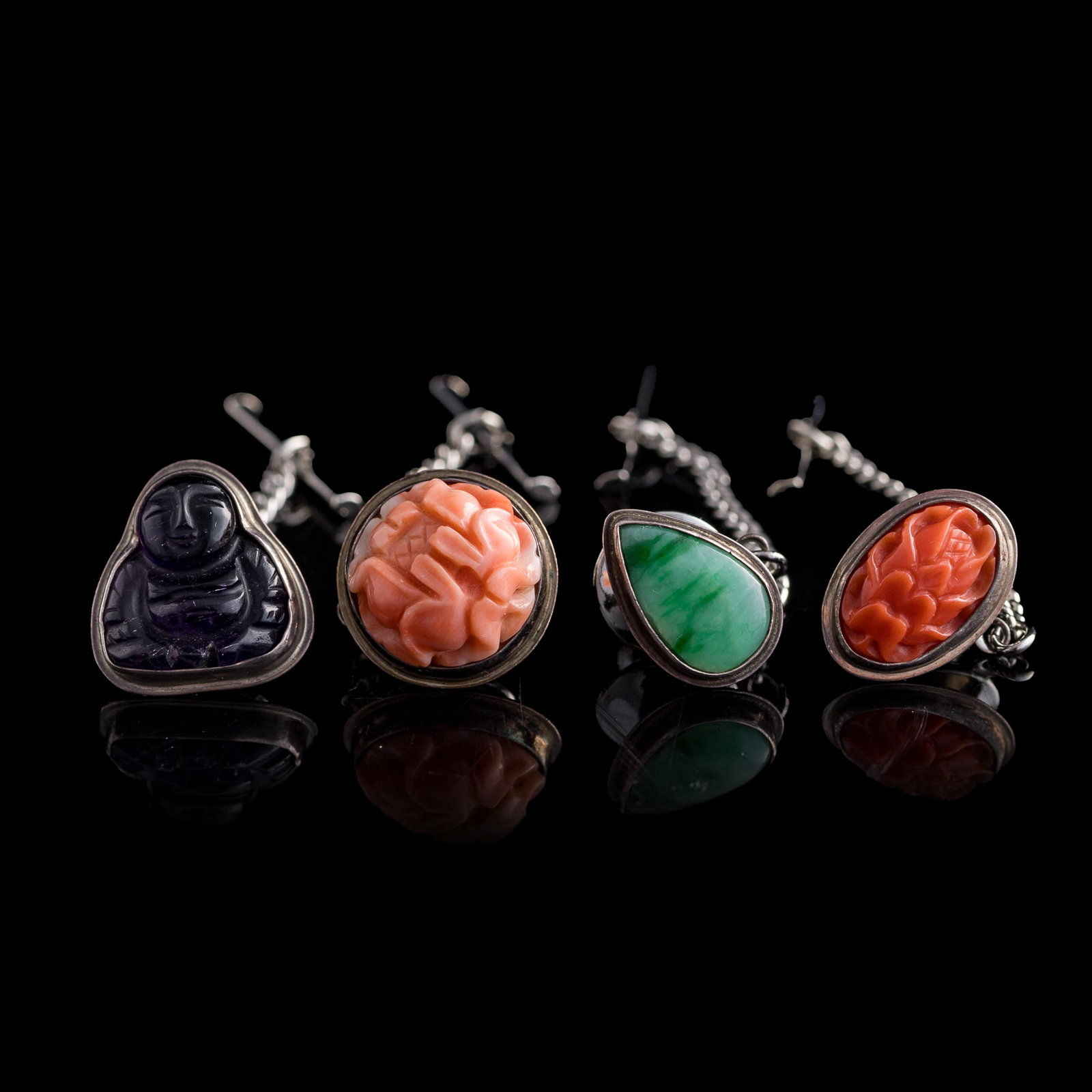 Four Chinese coral, jadeite and amethyst pendants, Republic period (1 of 9)
