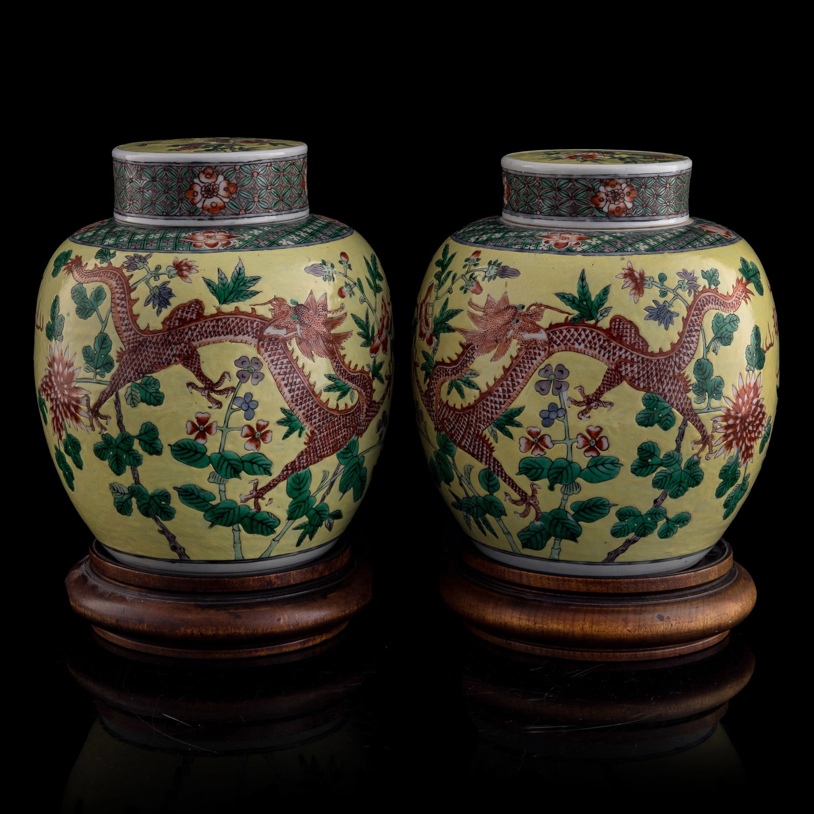 A pair of Chinese yellow-ground wucai dragon covered jars, late 19th century (1 of 8)
