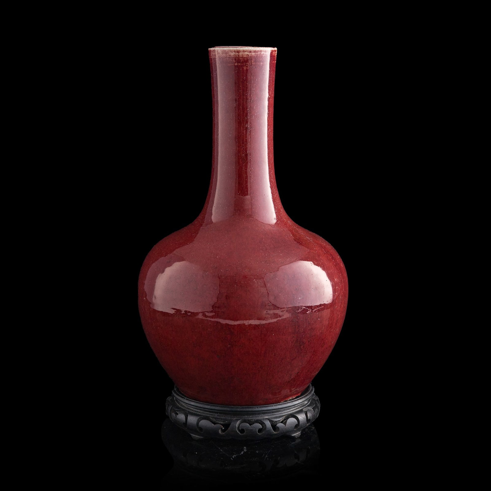 A Chinese red-glazed tianqiuping vase, early 19th century (1 of 7)
