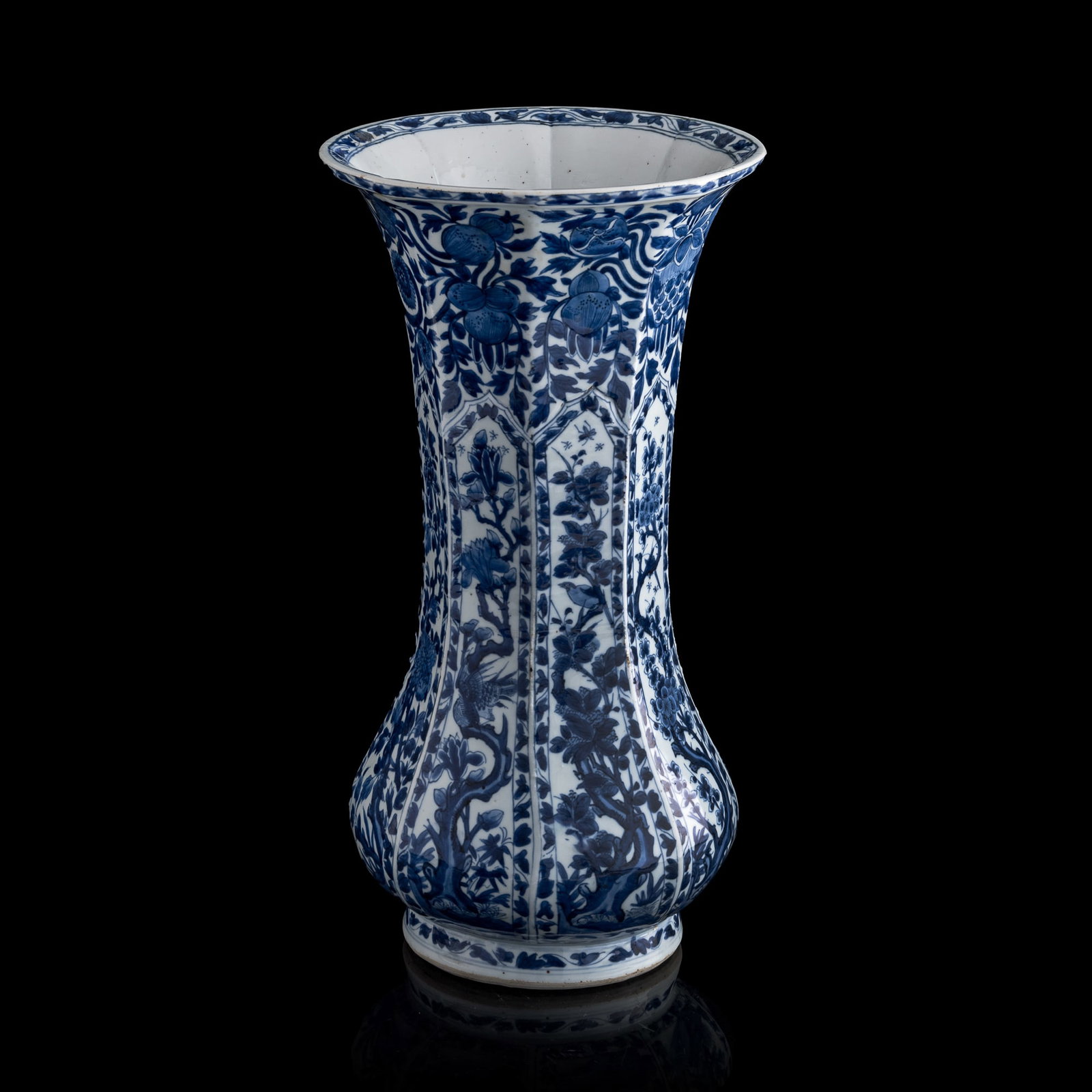 A Chinese export blue and white floral lobed vase, 18th century: A Chinese export blue and white floral lobed vase 18th century H: 18, Dia: 9 1/2 in. (H: 45.7, Dia: 24.1 cm.) Private collection, Pennsylvania. Click here for high