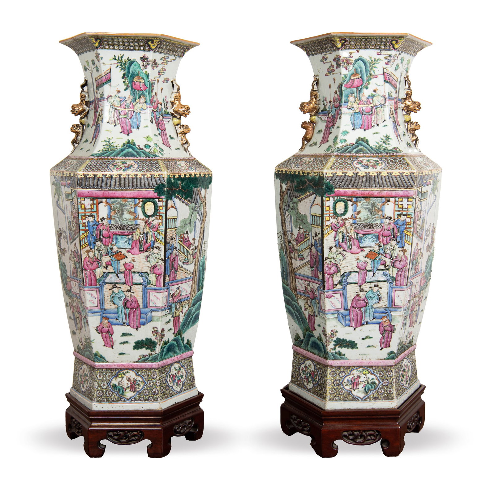 A pair of large Chinese famille rose hexagonal vases, Tongzhi period, Qing dynasty: A pair of large Chinese famille rose hexagonal vases Tongzhi period, Qing dynasty Depicting a large figural scene to the body and neck, accented by registers of tri-lobes and geometric patterning. Fea