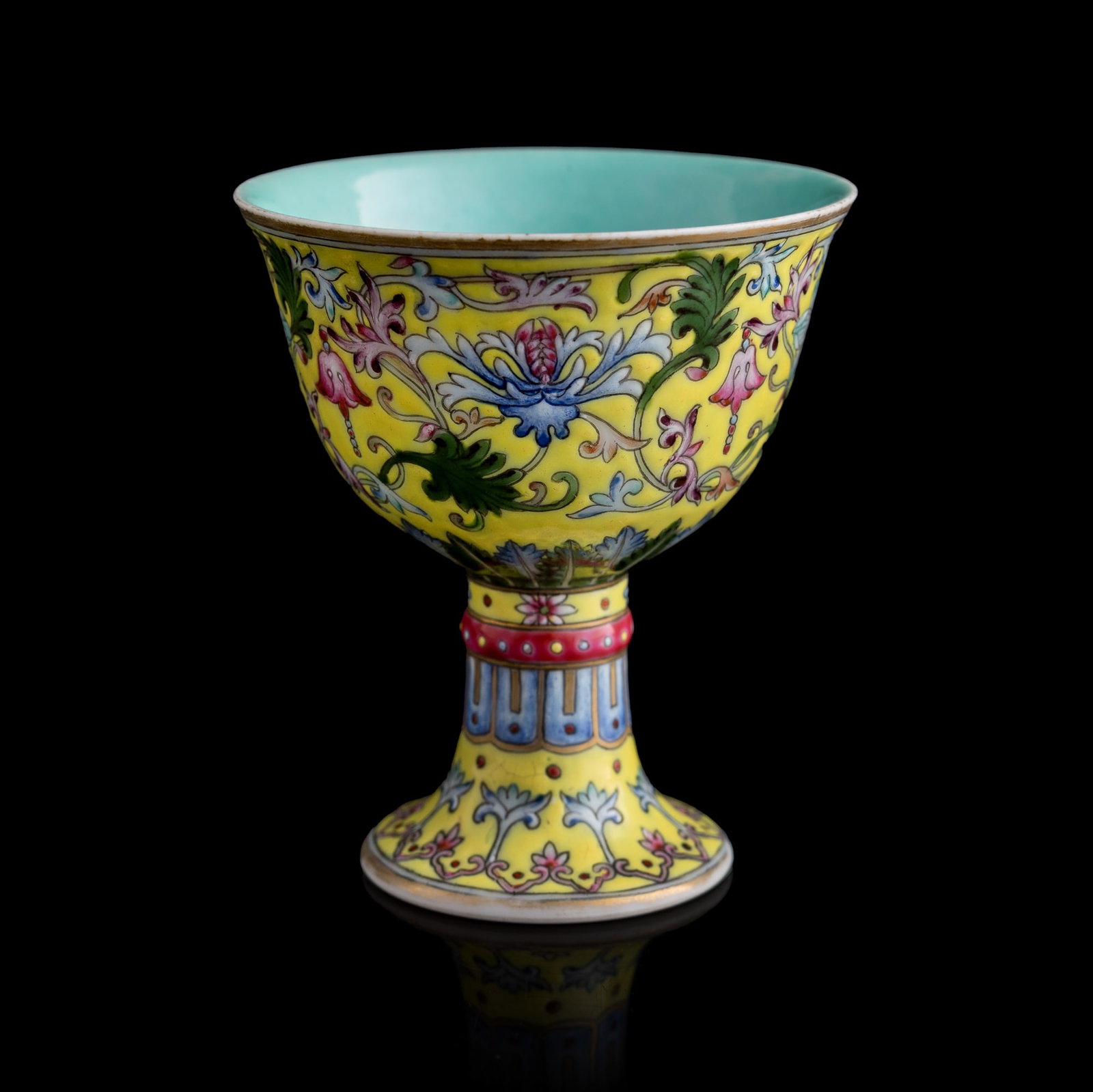 A Chinese yellow-ground yangcai stem cup, Republic period: A Chinese yellow-ground yangcai stem cup Republic period with four-character mark to underside H: 3 1/2, Dia: 3 in. (H: 8.9, Dia: 7.6 cm.) From an estate in Honolulu, Hawaii.