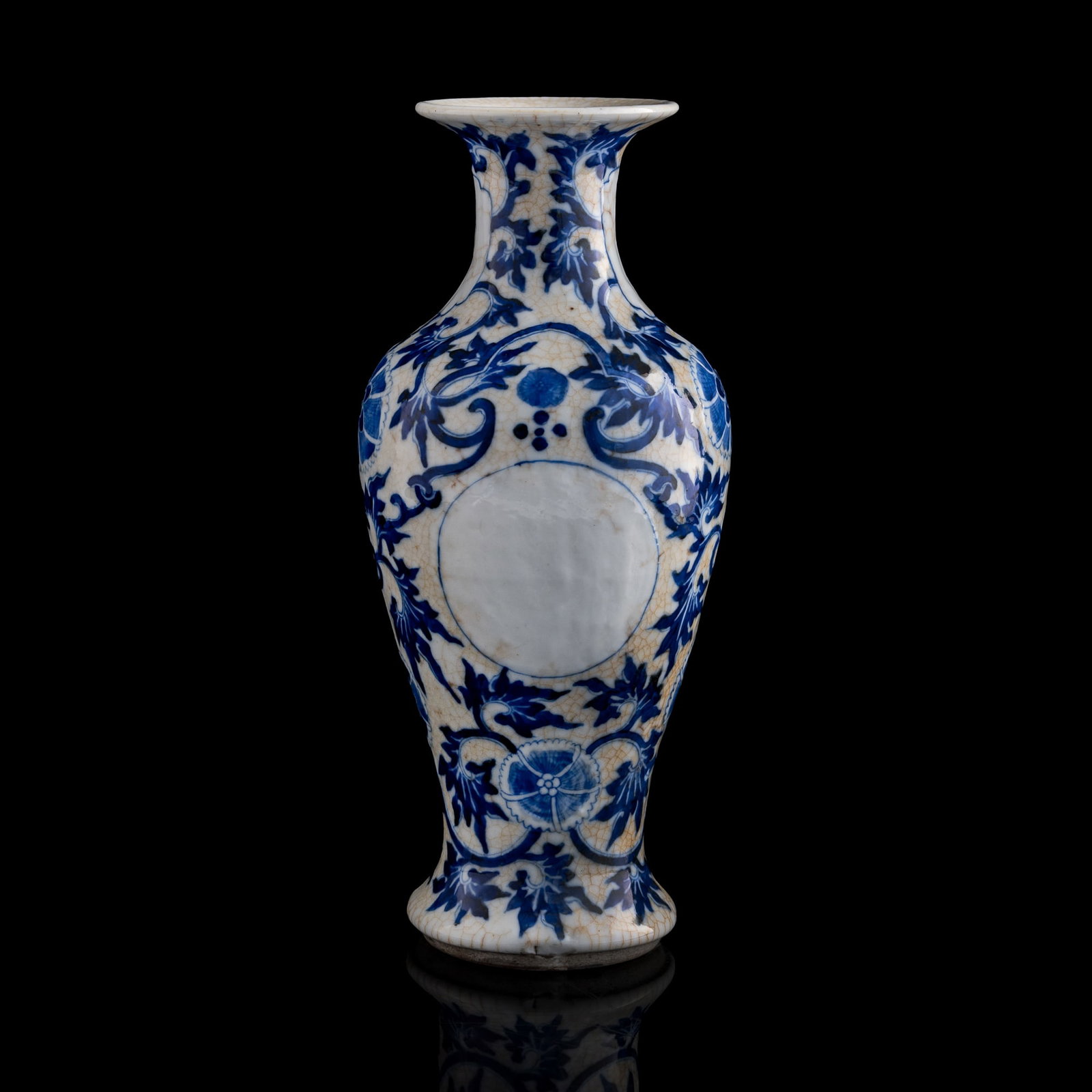 A Chinese blue and white floral Guanyin vase, 19th century: A Chinese blue and white floral Guanyin vase 19th century with four-character mark to underside H: 12 5/8, Dia: 5 1/2 in. (H: 32.1, Dia: 14 cm.) From an estate in San Diego, California.