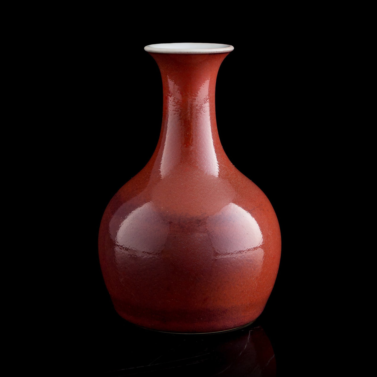 A Chinese sacrificial-red-glazed vase, Yongzheng period, Qing dynasty (1 of 8)