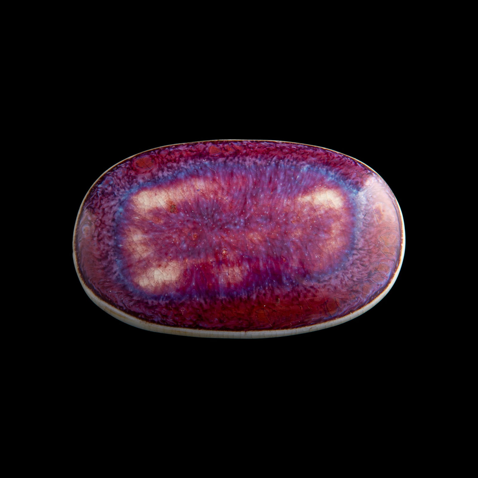 A Chinese flambe porcelain buckle, marked Li Bingqing, 18th century: A Chinese flambe porcelain buckle marked Li Bingqing, 18th century With a four-character "Li Bingqing zuo" mark to underside. H: 3/4, W: 2 5/8, D: 1 5/8 in. (H: 1.9, W: 6.7, D: 4.1 cm.) Private collec