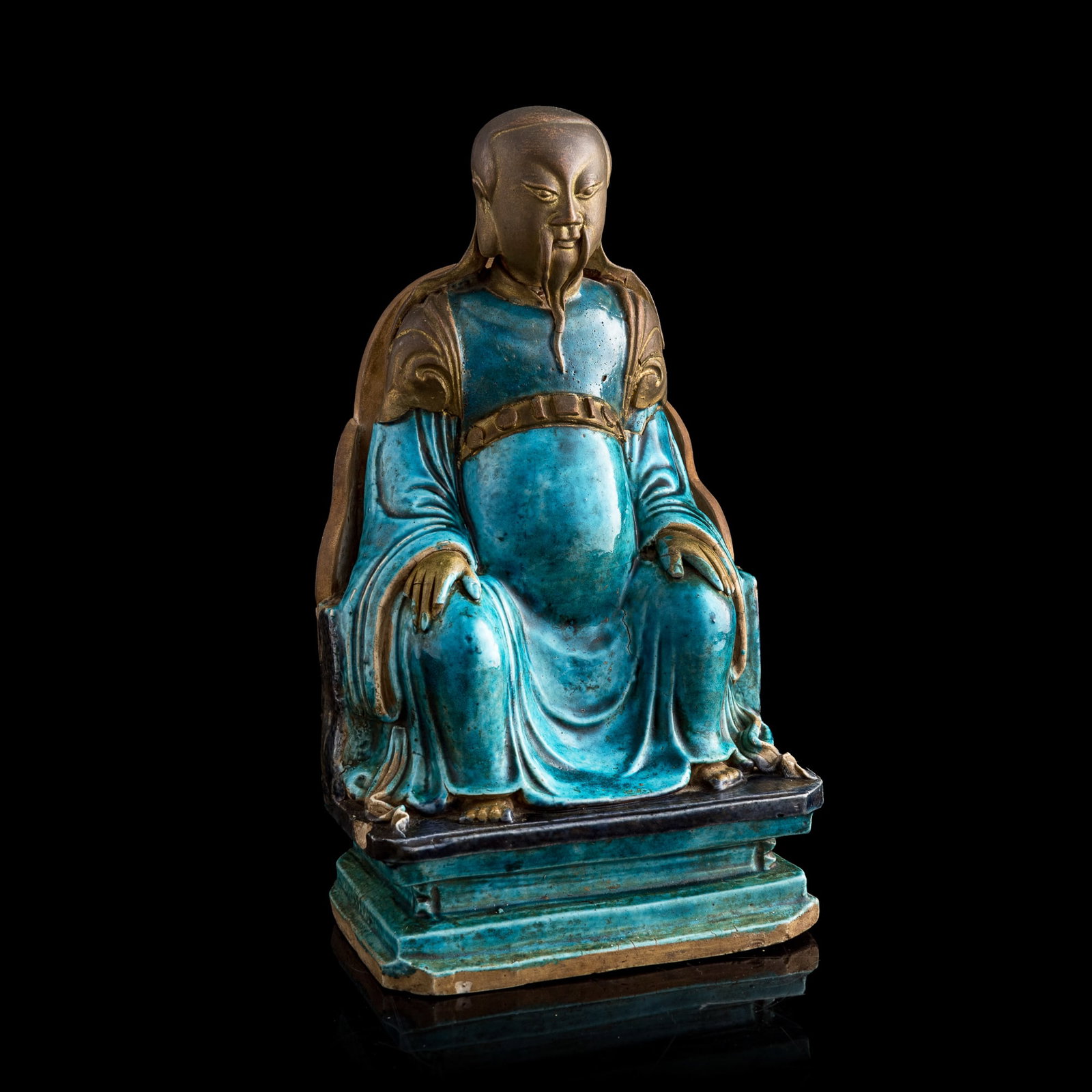 A Chinese sancai-glazed porcelain figure of Zhenwu, Ming dynasty (1 of 8)