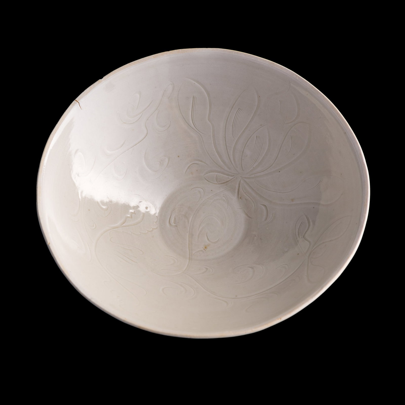 A Chinese carved Ding bowl, Song dynasty (1 of 6)