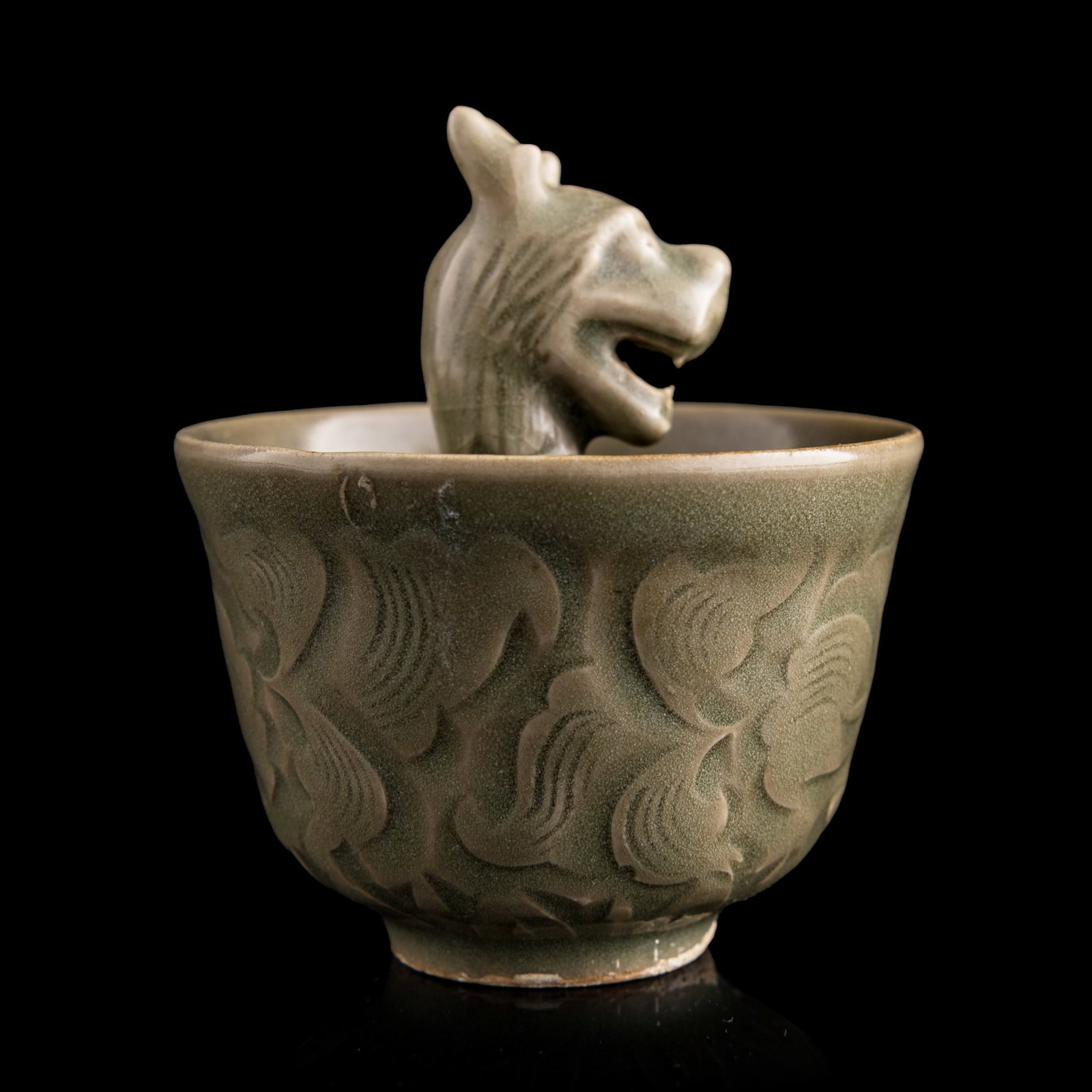A Chinese carved Yaozhou celadon Gongdao cup, Song/Yuan dynasty (1 of 9)