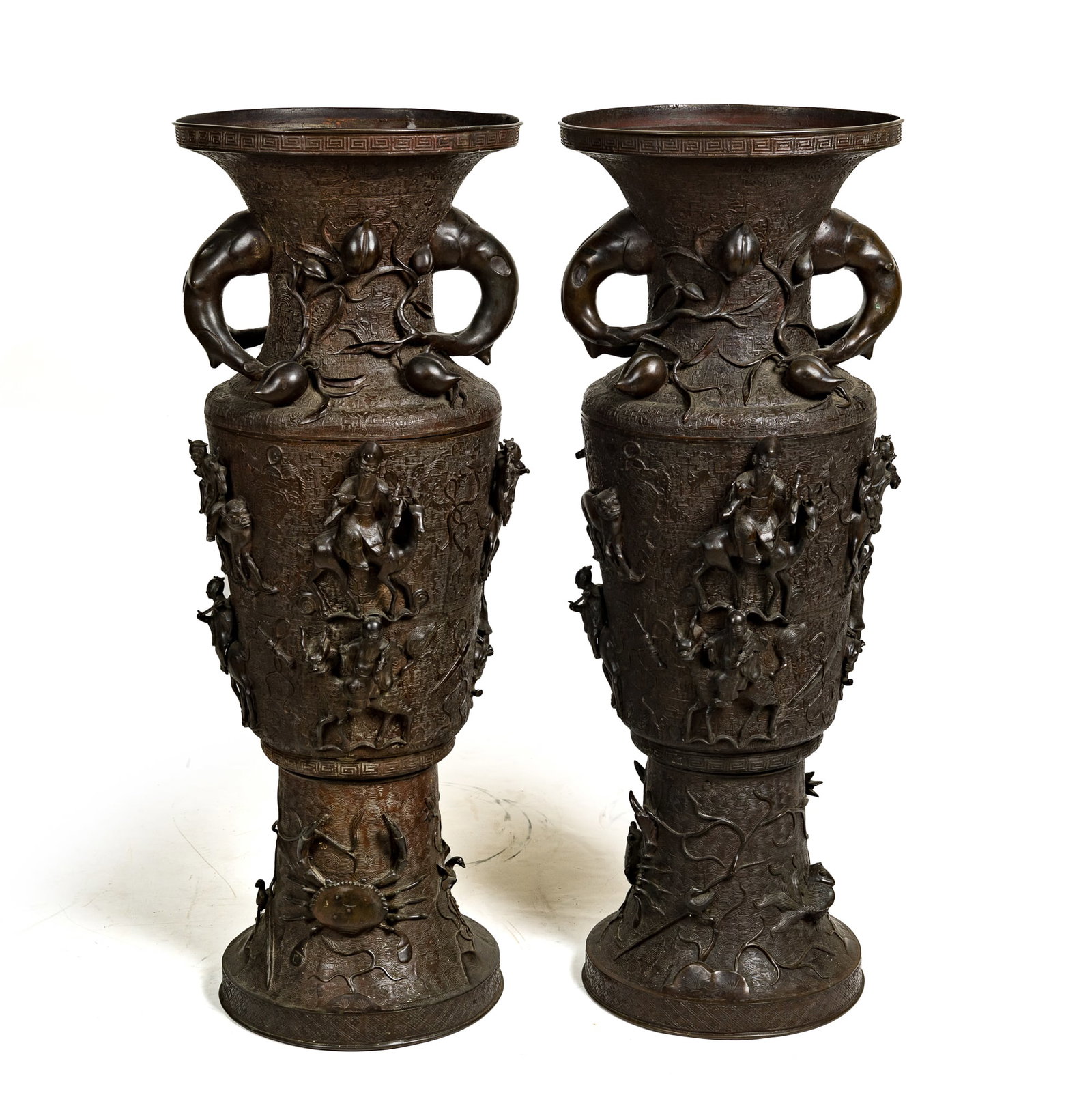 A pair of Chinese bronze 'immortals' elephant-head-handled vases, 18th century (1 of 10)