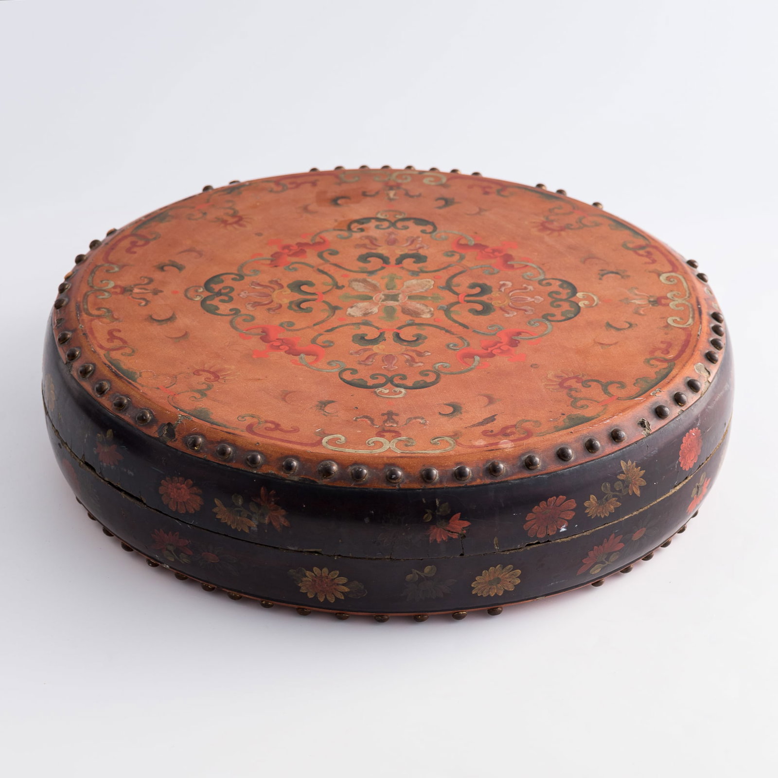 A Chinese painted wood drum-form lidded box, Qianlong period, Qing dynasty: A Chinese painted wood drum-form lidded box Qianlong period, Qing dynasty H: 4, Dia: 15 1/2 in. (H: 10.2, W: 39.4 cm.) Private collection, New York. Click here for