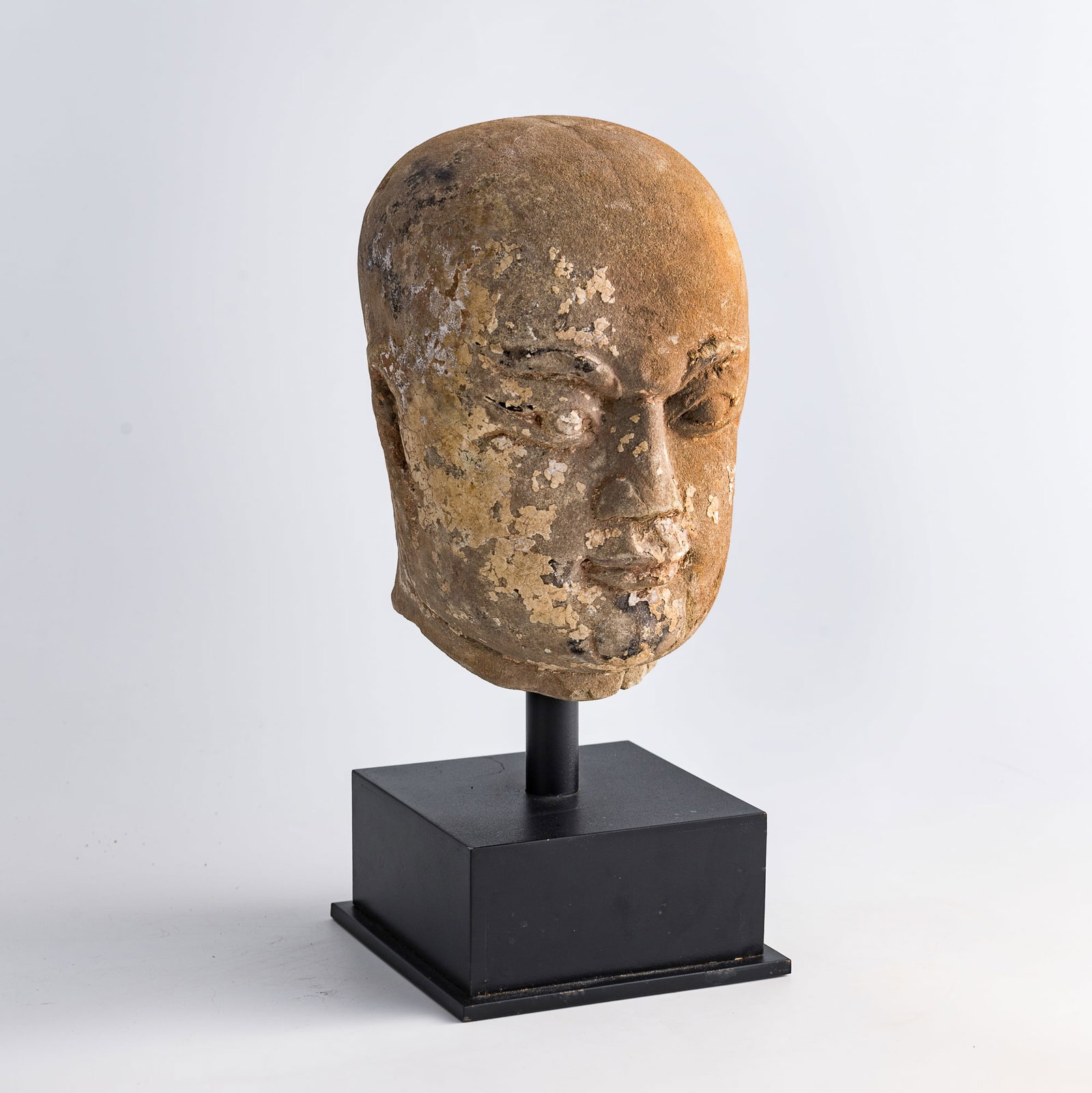 A Chinese carved stone Buddha head, Song dynasty or earlier (1 of 10)