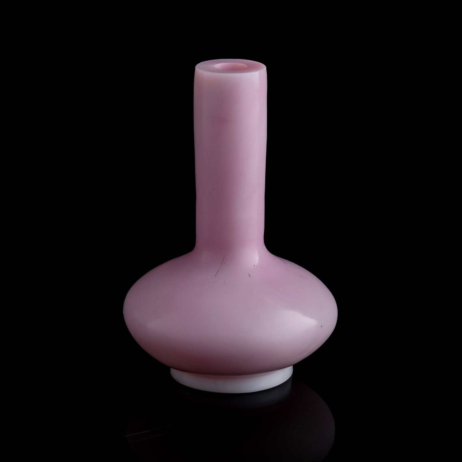 A Chinese glass water-chestnut-form vase, Qing dynasty: A Chinese glass water-chestnut-form vase Qing dynasty With four-character mark engraved to underside. H: 5 3/8, Dia: 3 1/2 in. (H: 13.7, Dia: 8.9 cm.) Private collection, Florida.