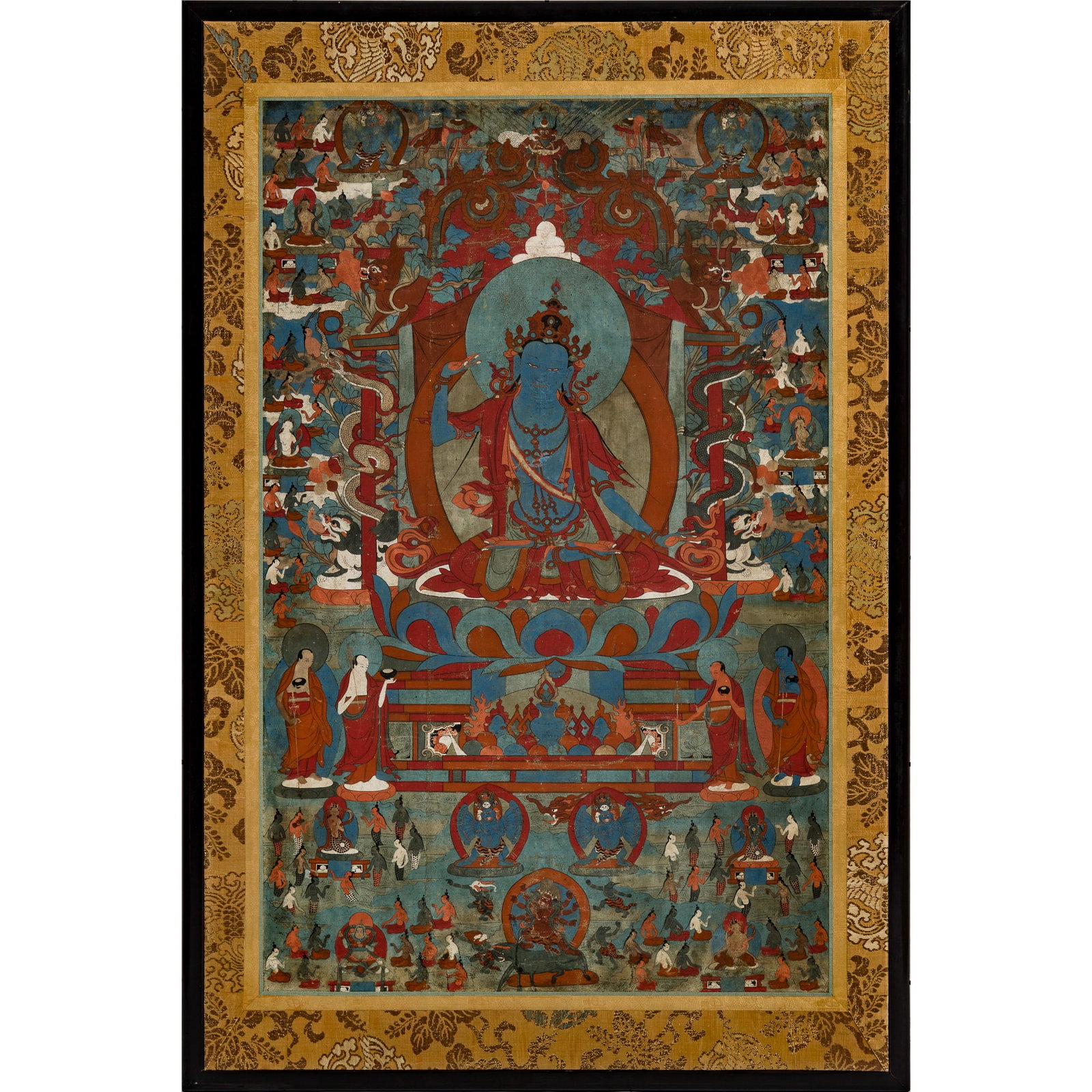 A Tibetan thangka of Akshobhya Buddha, 18th century: A Tibetan thangka of Akshobhya Buddha 18th century framed. Sight dimensions: H: 30 3/4, W: 19 in. (H: 78.1, W: 48.3 cm.) Overall dimensions: H: 37 1/2, W: 24 3/4 in. (H: 95.3, W: 62.9 cm.) From a priv