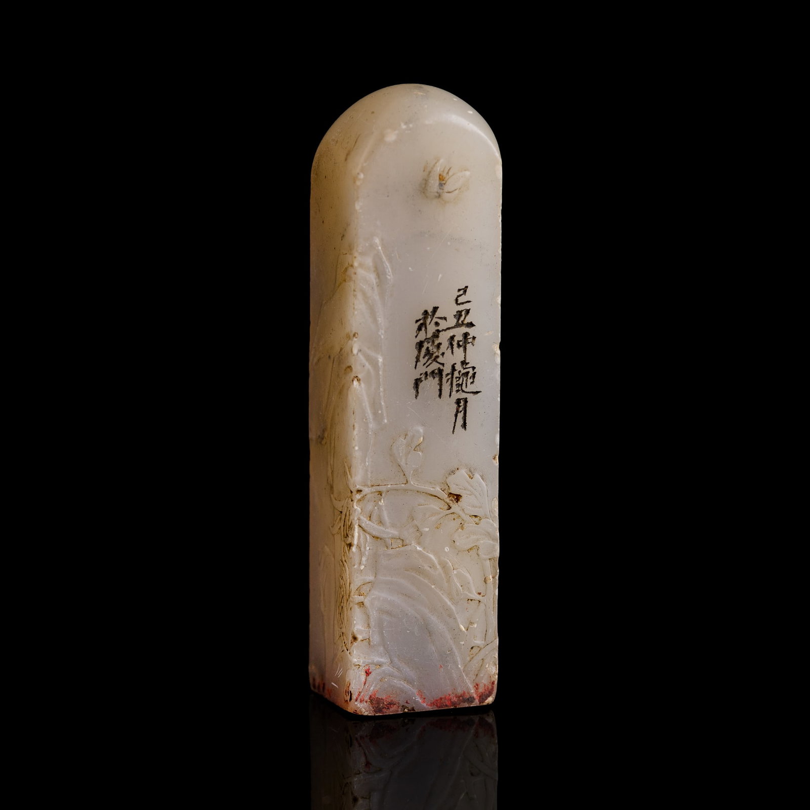 A Chinese carved Shoushan 'stone floral' seal, dated 1949: A Chinese carved Shoushan 'stone floral' seal dated 1949 with inscription that reads 'Mid-Autumn month of the Jichou year (1949), at Xiamen" H: 3 1/4, W: 3/4. D: 3/4 in. (H: 8.3, W: 1.9, D: 1.9 cm.) P