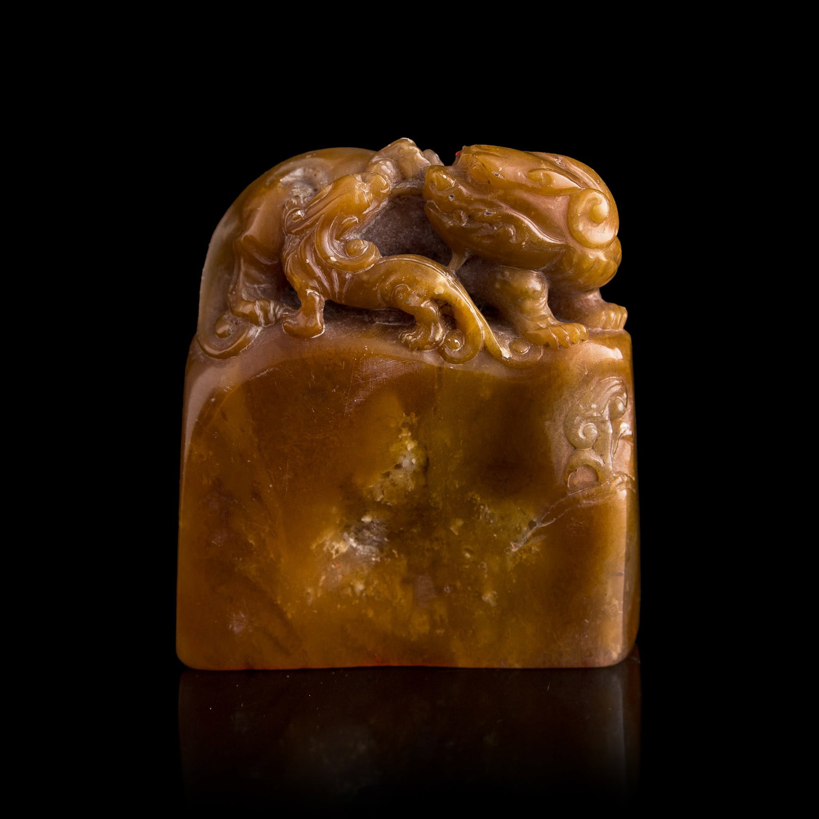 A Chinese Shoushan stone 'lions' seal, Republic period: A Chinese Shoushan stone 'lions' seal Republic period with two-character inscription to underside H: 2 1/2, W: 2 1/8, D: 3/4 in. (H: 6.4, W: 5.4, D: 1.9 cm.) Private collection, Southern California.