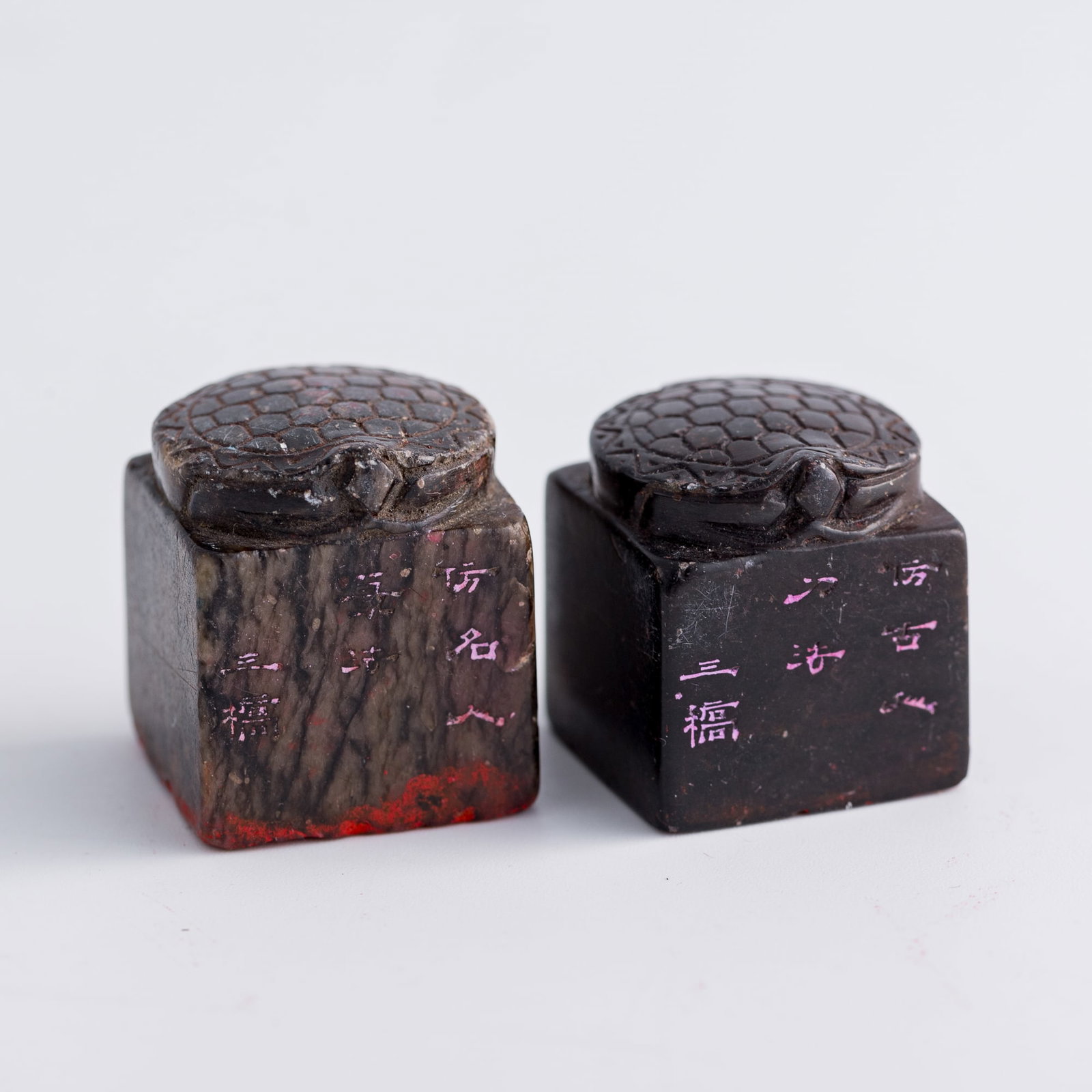 Two Chinese jade tortoise-finial seals, attributed to Wen Peng, Ming dynasty: Two Chinese jade tortoise-finial seals attributed to Wen Peng, Ming dynasty Each body carved with "Sanqiao," a sobriquet of Wen Peng. (2). H: 1, W: 7/8, D: 7/8 in. (H: 2.5, W: 2.2, D: 2.2 cm. (tallest