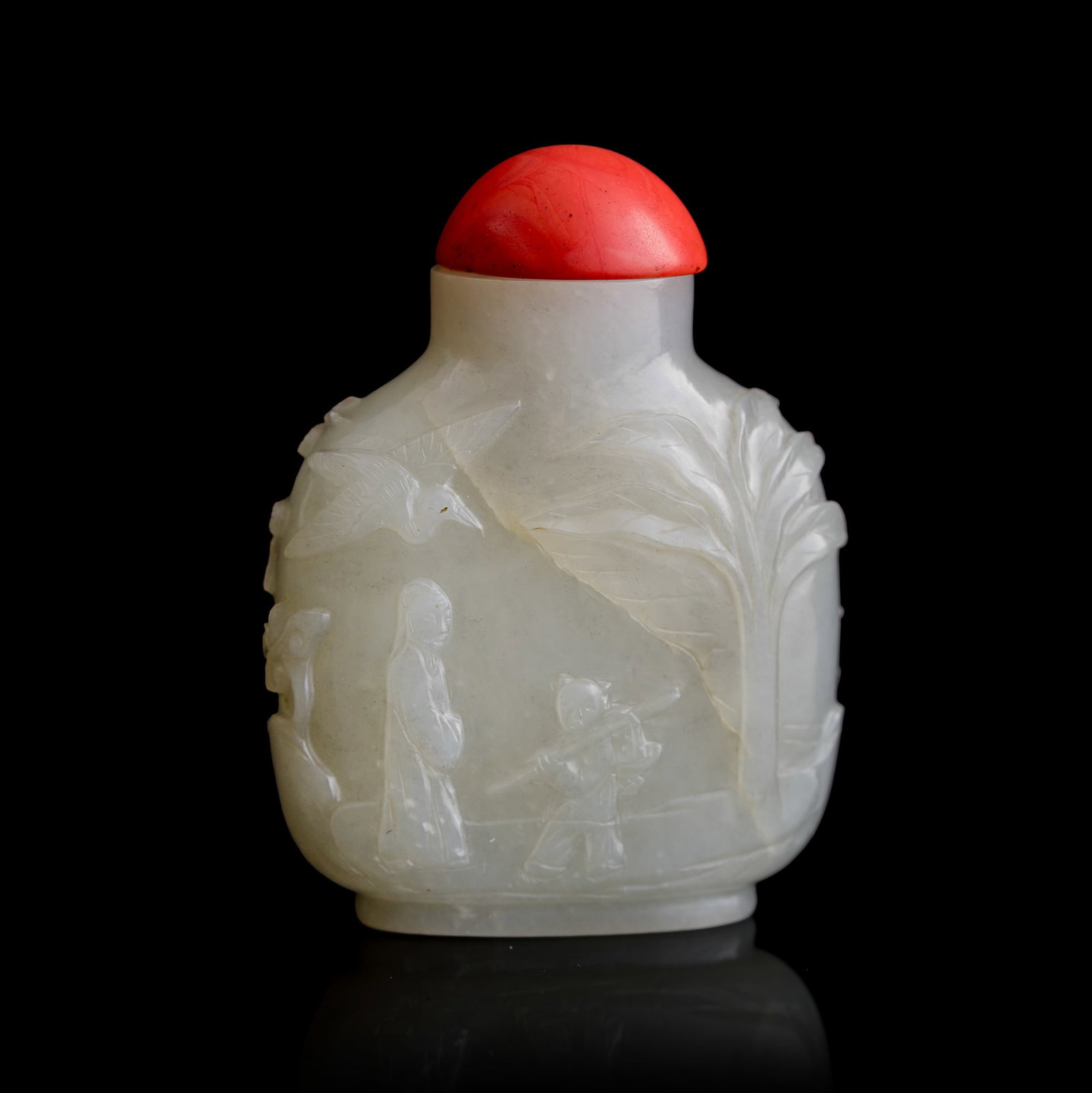A Chinese white jade 'figural' snuff bottle, 18th/19th century: A Chinese white jade 'figural' snuff bottle 18th/19th century H: 2 3/4, W: 2, D: 1 in. (H: 7, W: 5.1, D: 2.5 cm.) Private collection, Florida. Click here for high