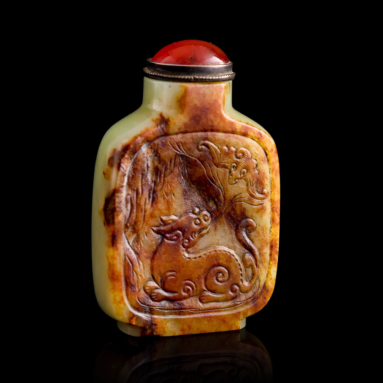 A Chinese yellow jade 'beast' snuff bottle with russet skin, 18th century (1 of 8)