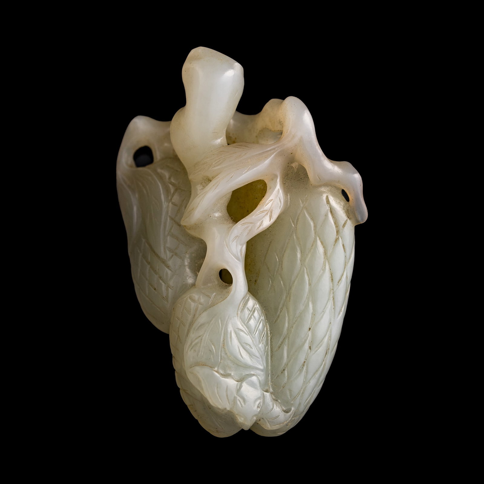 A Chinese white jade lychee-form snuff bottle, 18th century: A Chinese white jade lychee-form snuff bottle 18th century H: 2 3/4, W: 1 3/8, D: 1 1/4 in. (H: 7, W: 3.5, D: 3.2 cm.) Private collection, Southern California. Cli