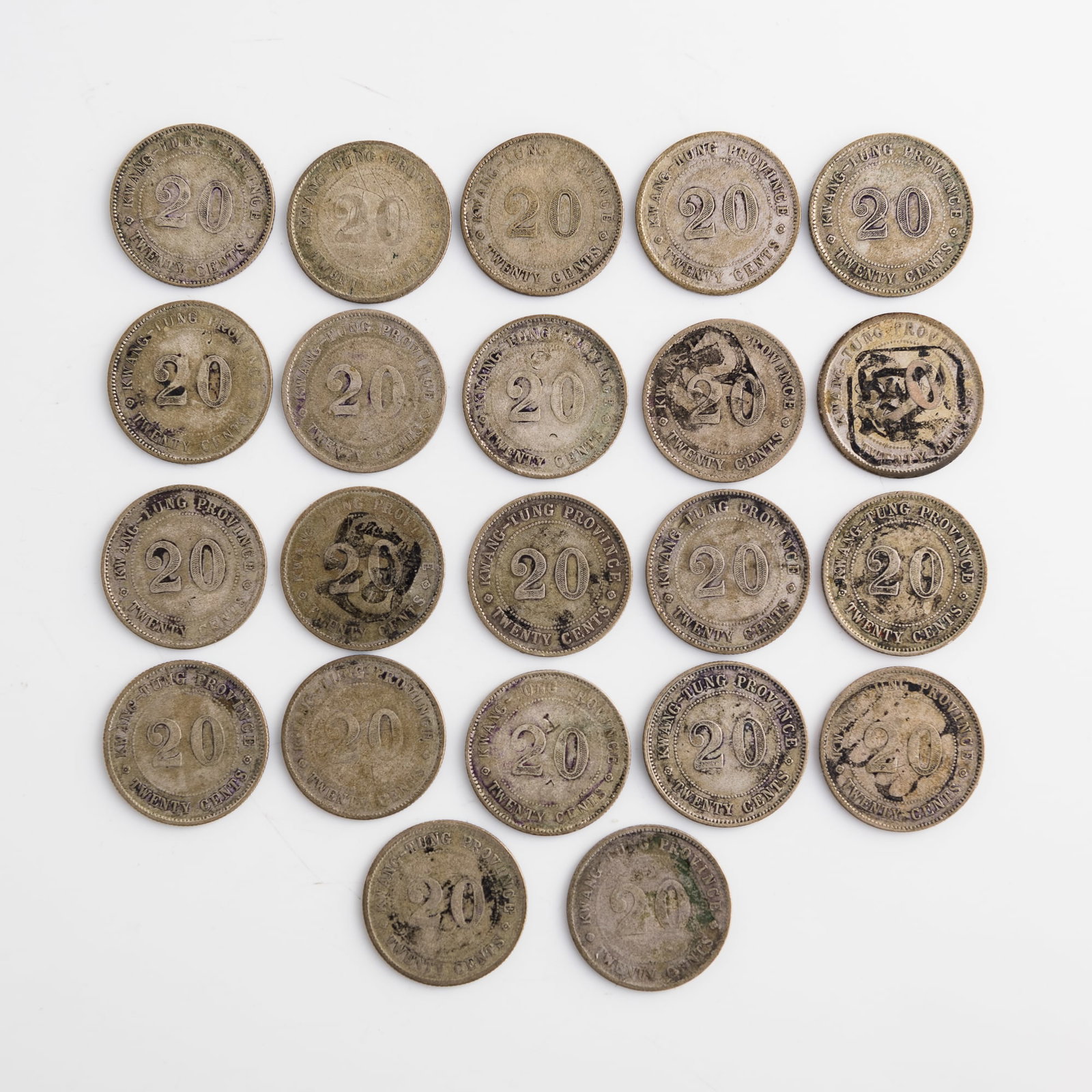 Twenty-two Kwangtung 20-cent coins, 1920: Twenty-two Kwangtung 20-cent coins 1920 Diameter range: 23.4-23.6 mm; depth range: 1.2-1.3 mm Weight varies. Overall: 115 g Lots 1-15 are from the estate of a woman in Silver Spring, Maryland. Her fat