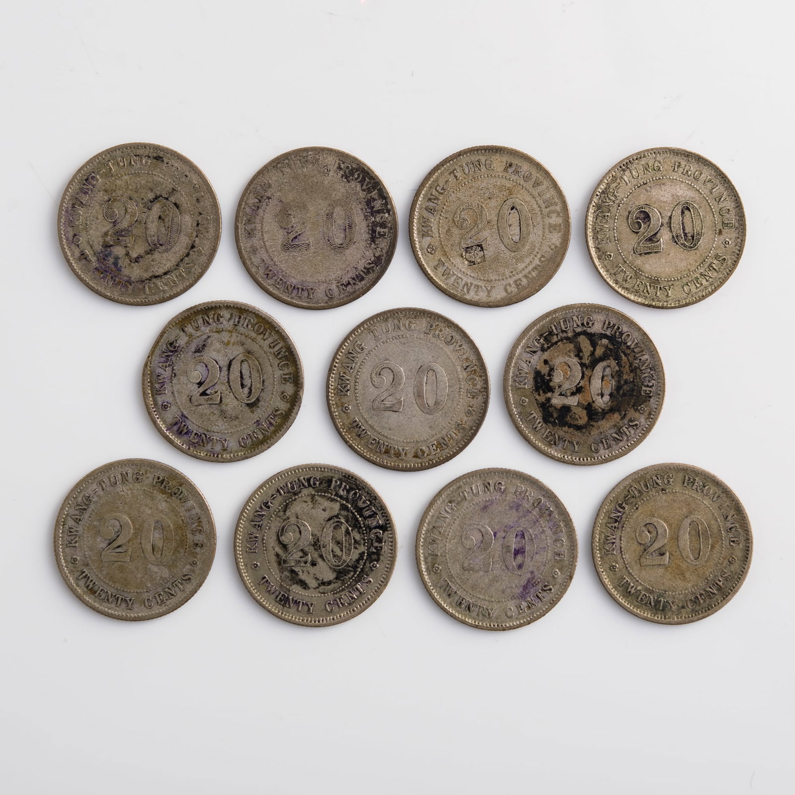 Eleven Kwangtung 20-cent coins, 1921: Eleven Kwangtung 20-cent coins 1921 Diameter range: 23.5-23.8 mm; depth range: 1.2-1.4 mm Weight varies. Overall: 57.8 g Lots 1-15 are from the estate of a woman in Silver Spring, Maryland. Her father