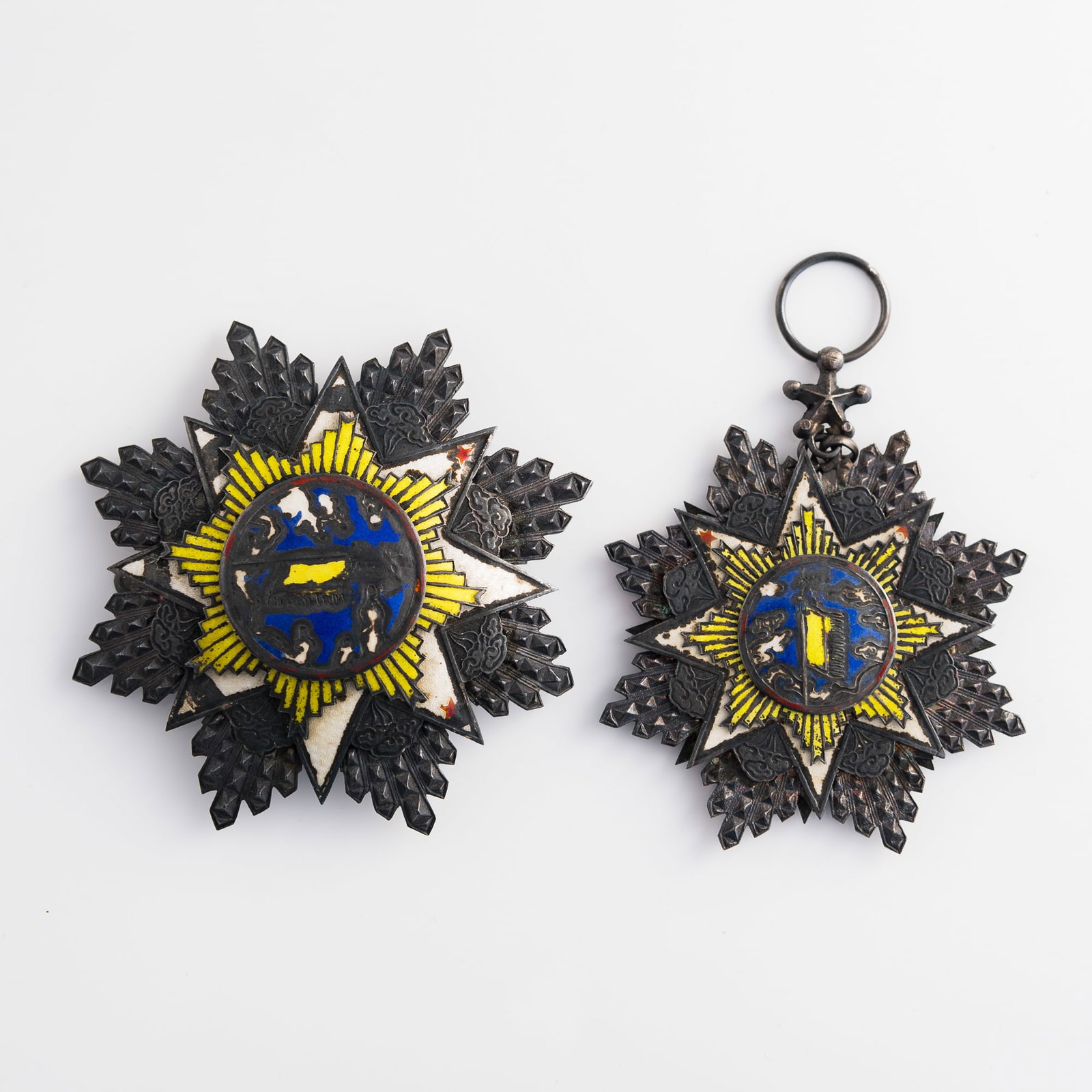 A Chinese First Class Order of the Cloud and Banner breast star and badge, Republic period: A Chinese First Class Order of the Cloud and Banner breast star and badge Republic period H: 3, W: 3 1/2, D: 3/4 in. (H: 7.6, W: 8.9, D: 1.9 cm. (largest)) Weight: 147 g (overall) Lots 1-15 are from t