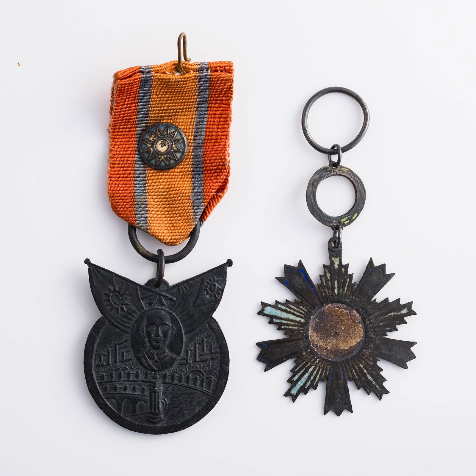 A Chinese War of Resistance Victory Commemorative Medal and another medal, Republic period: A Chinese War of Resistance Victory Commemorative Medal and another medal Republic period Medal: H: 1 3/4, W: 1 3/8, D: 1/8 in. (H: 4.4, W: 3.5, D: 0.3 cm. (largest)) Weight: 40.4 g (overall) Lots 1-1