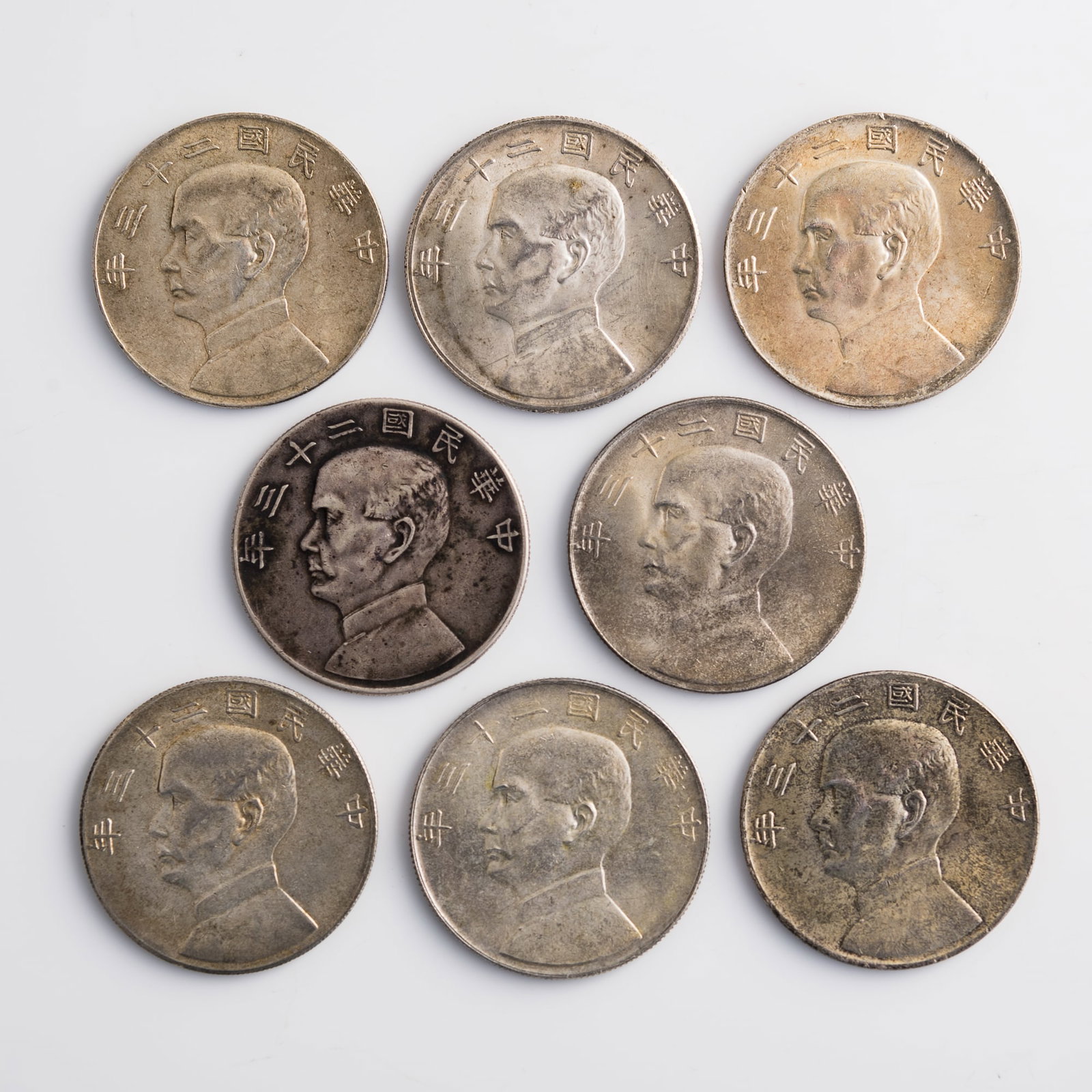 Eight Sun Yat-sen 'junk' silver dollars, 1934