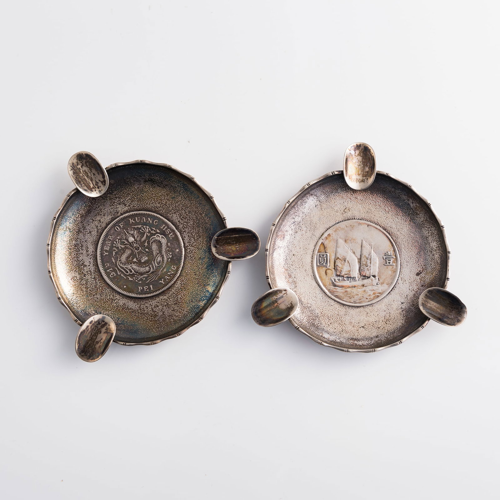 Two ashtrays inset with Chinese dollars, late Qing to Republic period (1 of 7)