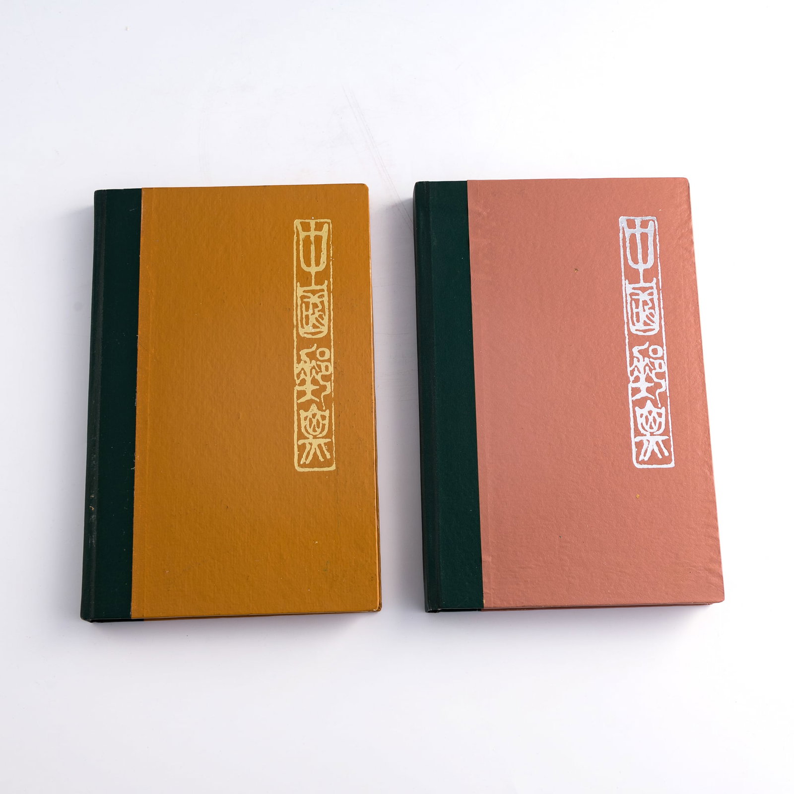 Two Chinese Stamp Albums, 1977-1982: Two Chinese Stamp Albums 1977-1982 Stamps include a complete uncut sheet of the 1981 T69 (12-12) 'Miaoyu Serving Tea' stamps, the complete 1980 T44 'Selected Paintings of Qi Baishi' 16 stamp set, as