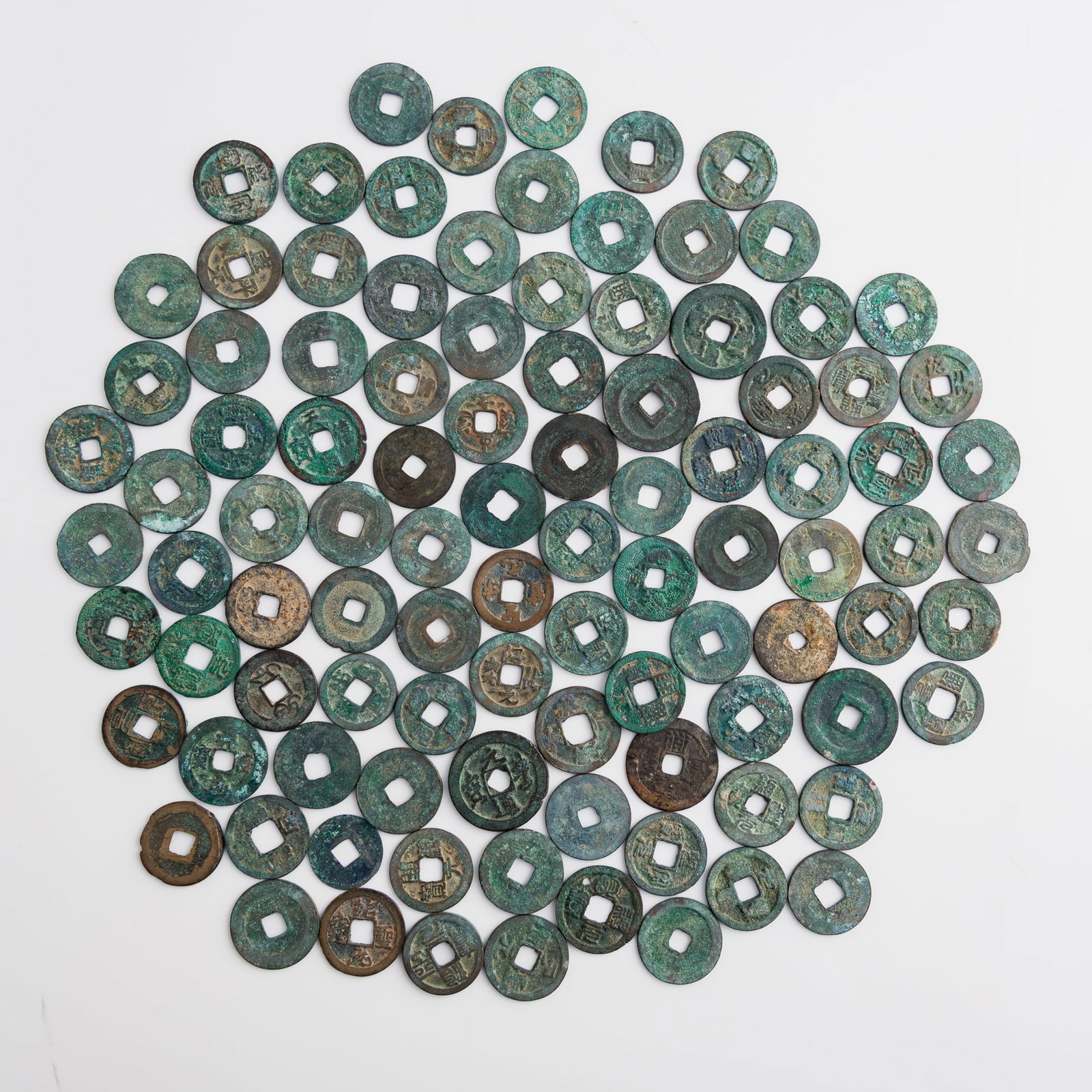 A group of 99 ancient Chinese coins, Various dynasties and reign periods: A group of 99 ancient Chinese coins Various dynasties and reign periods Dimension varies; typical coin: Dia: 25.11, D: 1.59 mm. Weight varies; typical coin: 3.82 g From the estate of Mr. and Mrs.