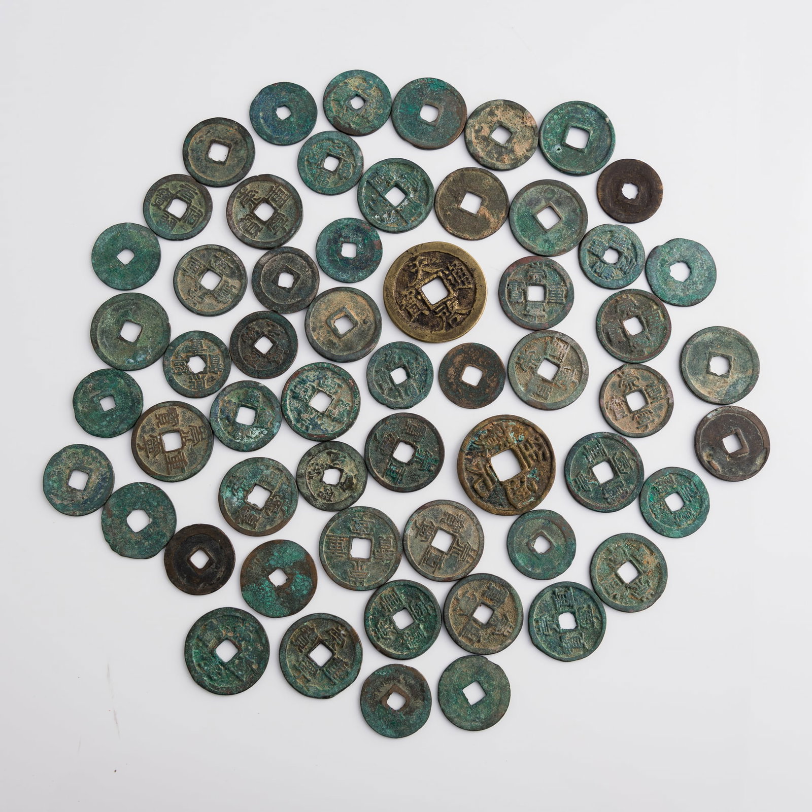 A group of 57 ancient Chinese coins, Various dynasties and reign periods: A group of 57 ancient Chinese coins Various dynasties and reign periods Dimensions varies. Largest: Dia: 45.3, D: 2.8 mm. Weight varies; heaviest: 31.33 g From the estate of Mr. and Mrs. Martinson,
