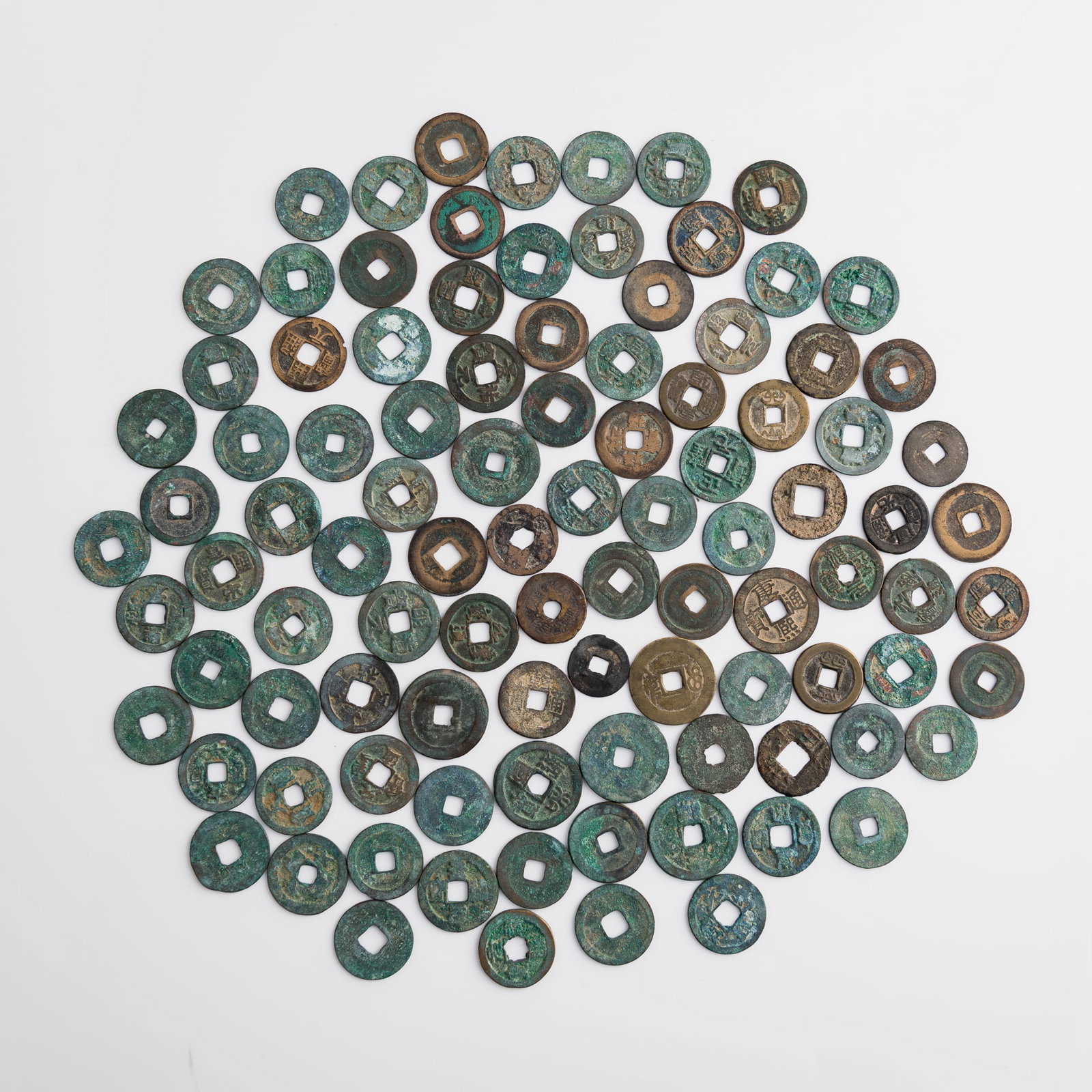 A group of 99 ancient Chinese coins, Various dynasties and reign periods: A group of 99 ancient Chinese coins Various dynasties and reign periods Dimension varies; typical coin: Dia: 25.45, D: 1.35 mm. Weight varies; typical coin: 4.21 g From the estate of Mr. and Mrs.