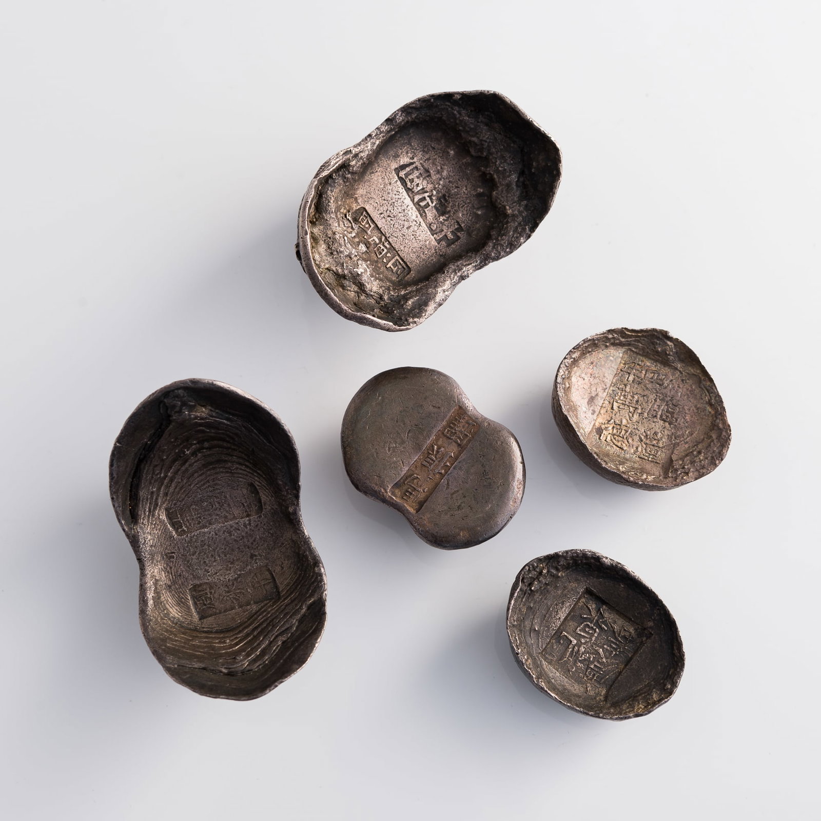 Five Chinese stamped silver ingots (1 of 9)