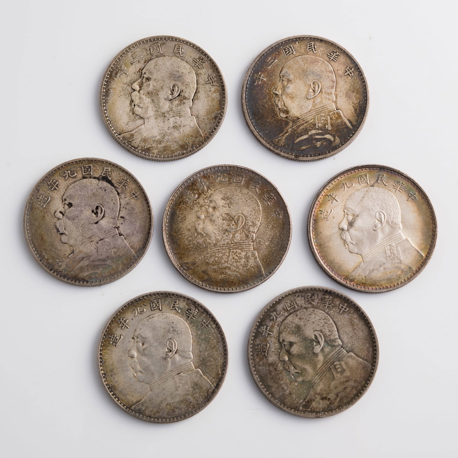 Seven Chinese 'Yuan Shikai' silver dollars, 1914 and 1920 (1 of 7)